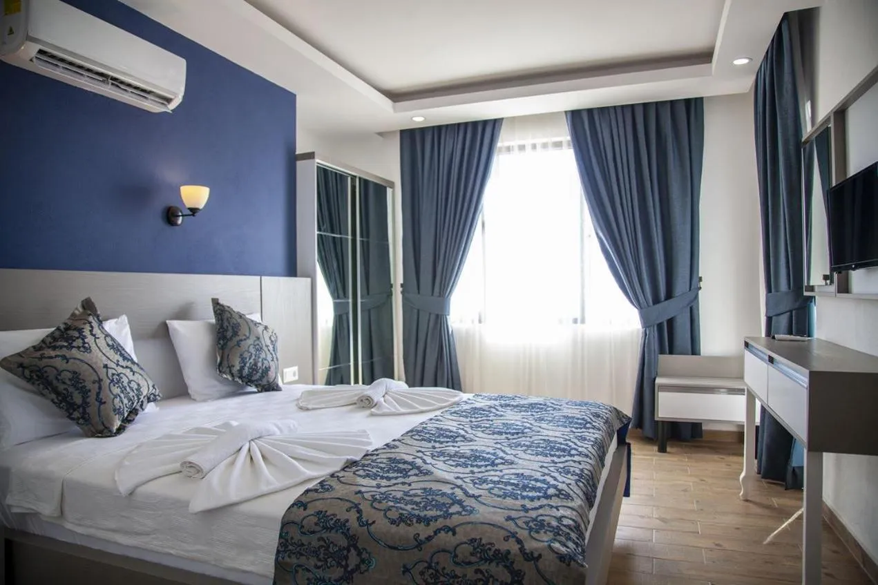 Bed in Demyra Boutique Hotel