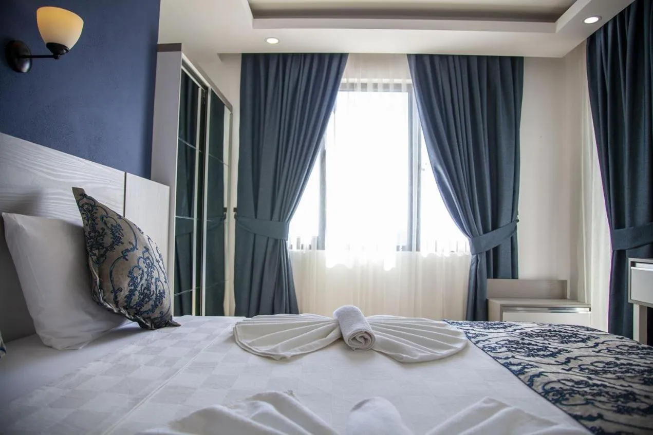 Bed in Demyra Boutique Hotel