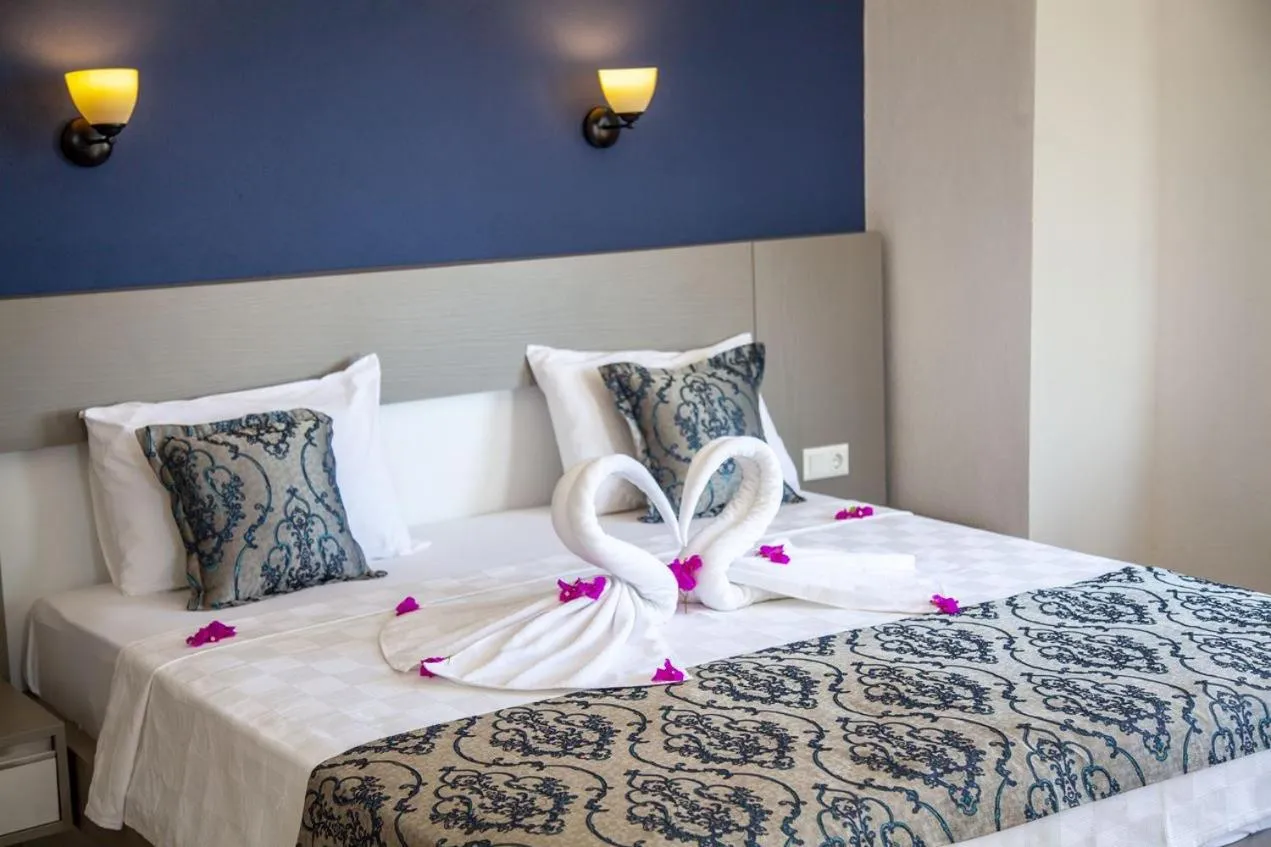 Bed in Demyra Boutique Hotel