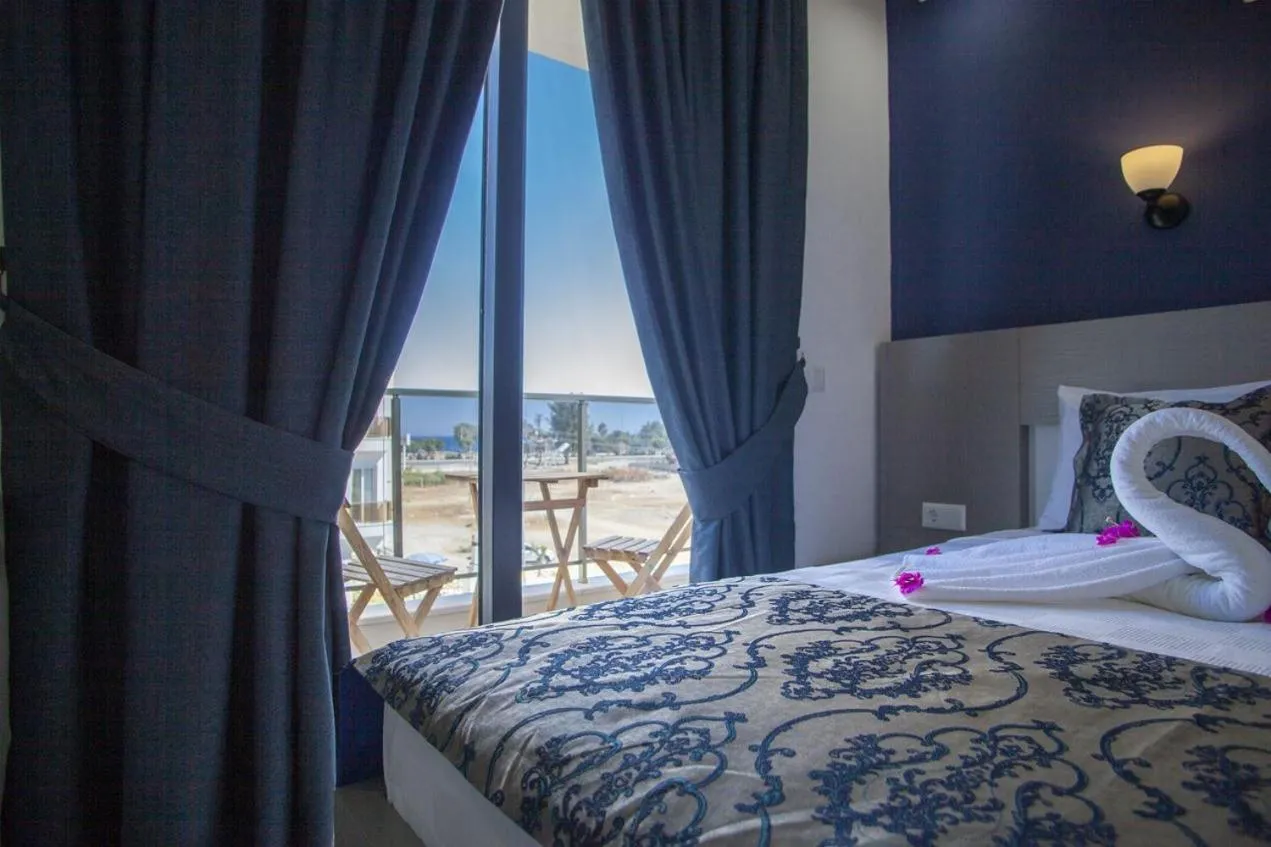 Bed in Demyra Boutique Hotel