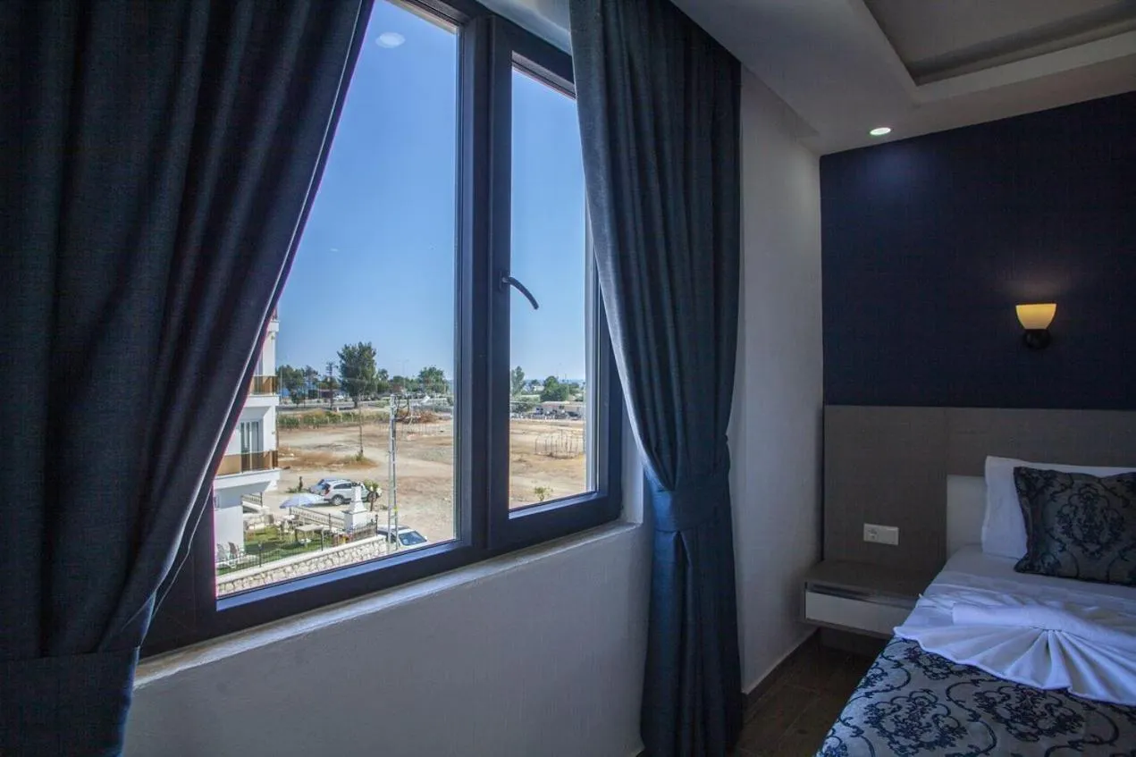 Bed in Demyra Boutique Hotel