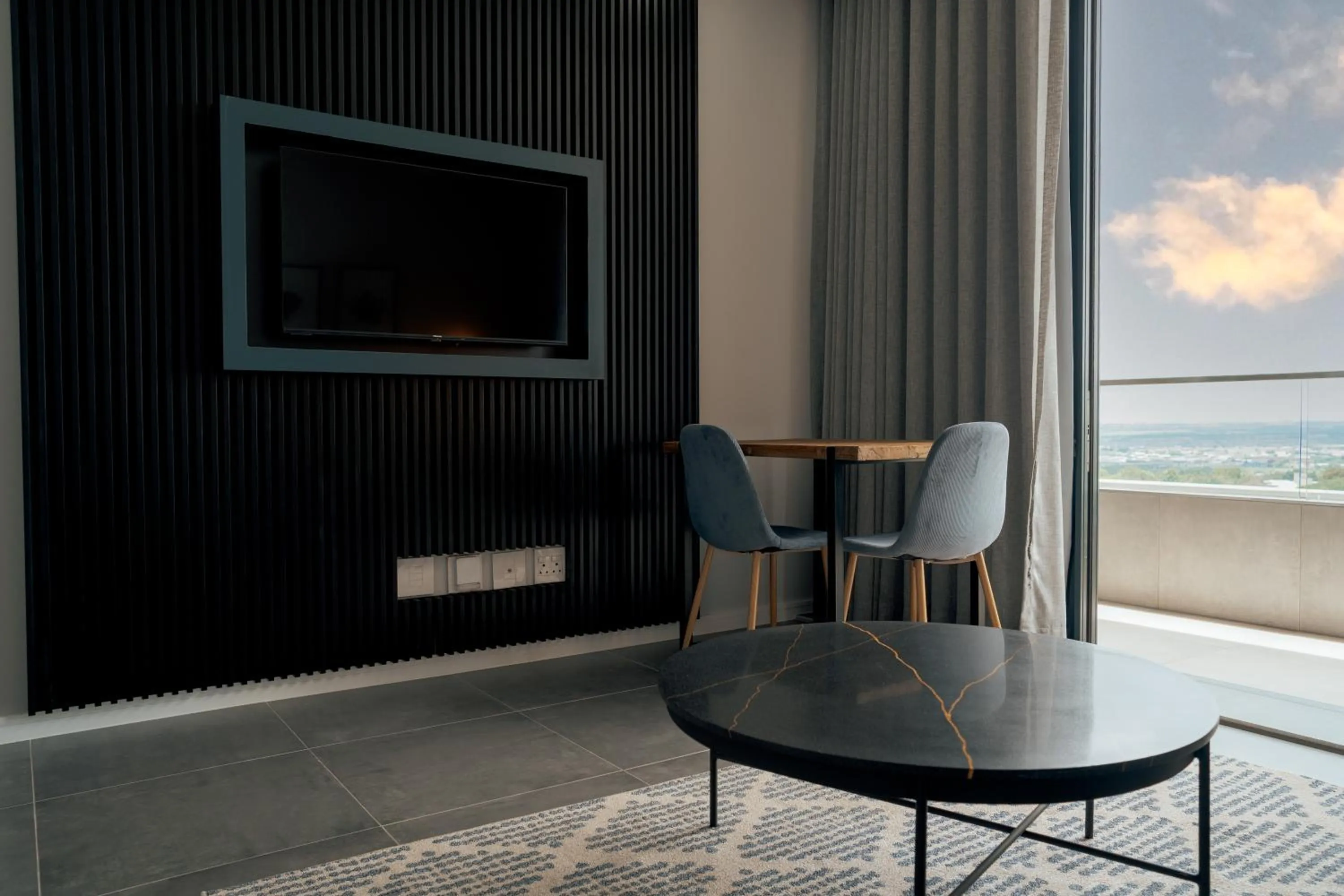 Living room in Reserved Suites Illovo