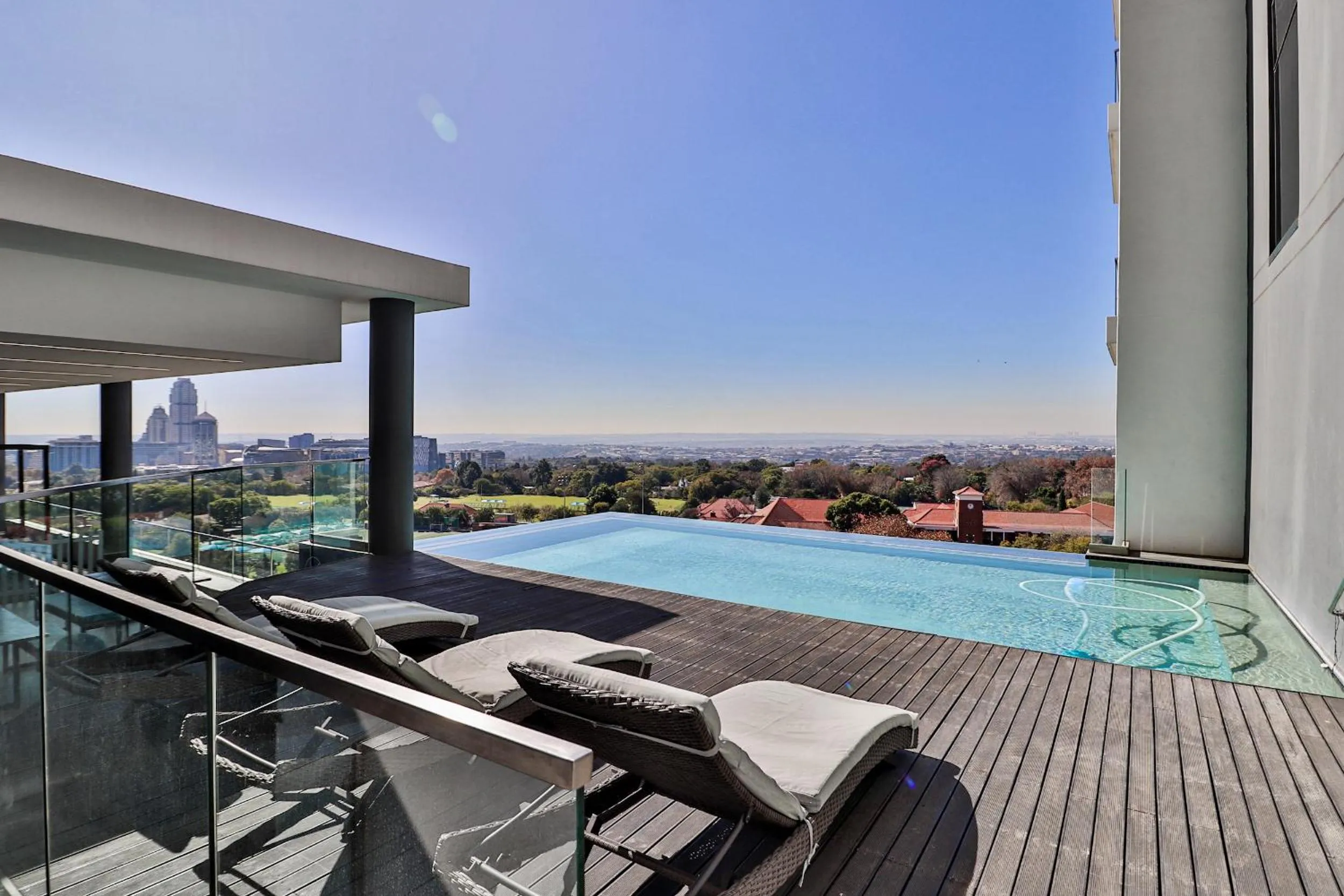 Swimming pool in Reserved Suites Illovo