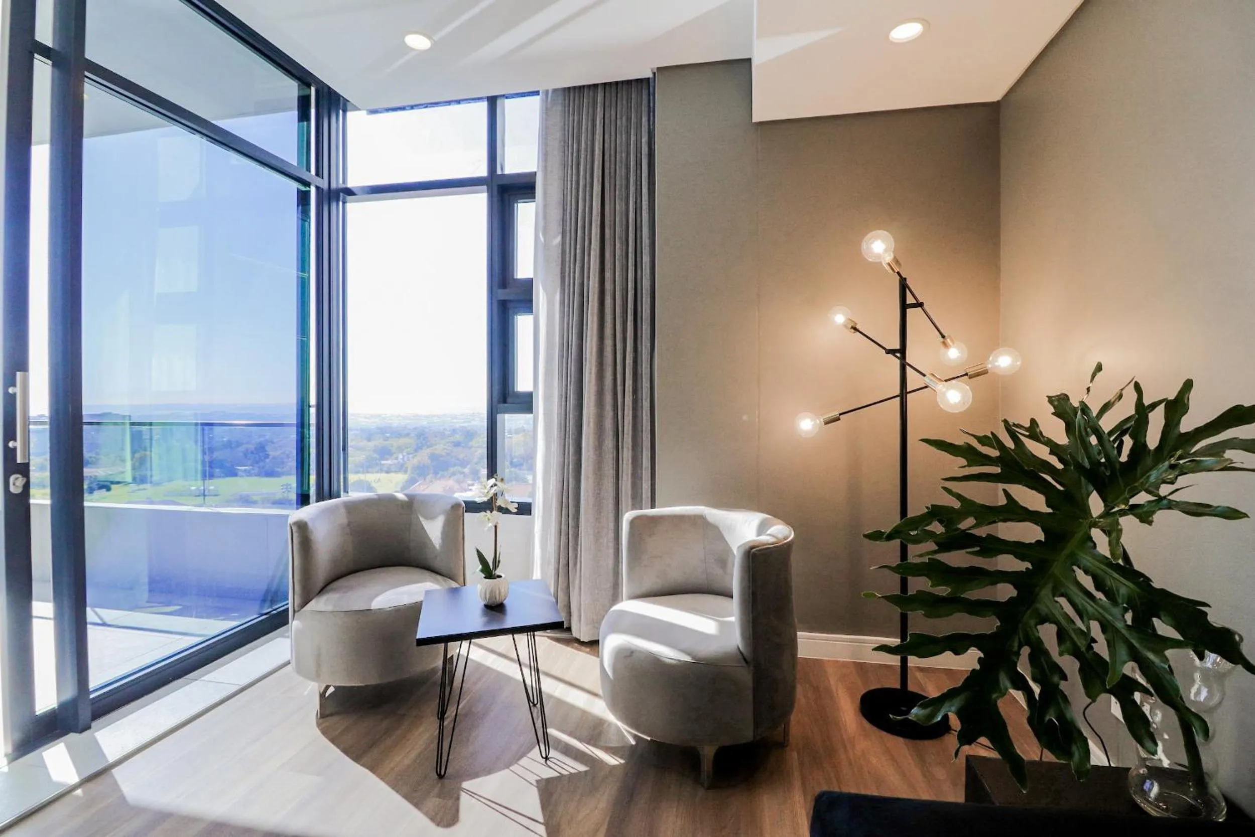 Seating area in Reserved Suites Illovo