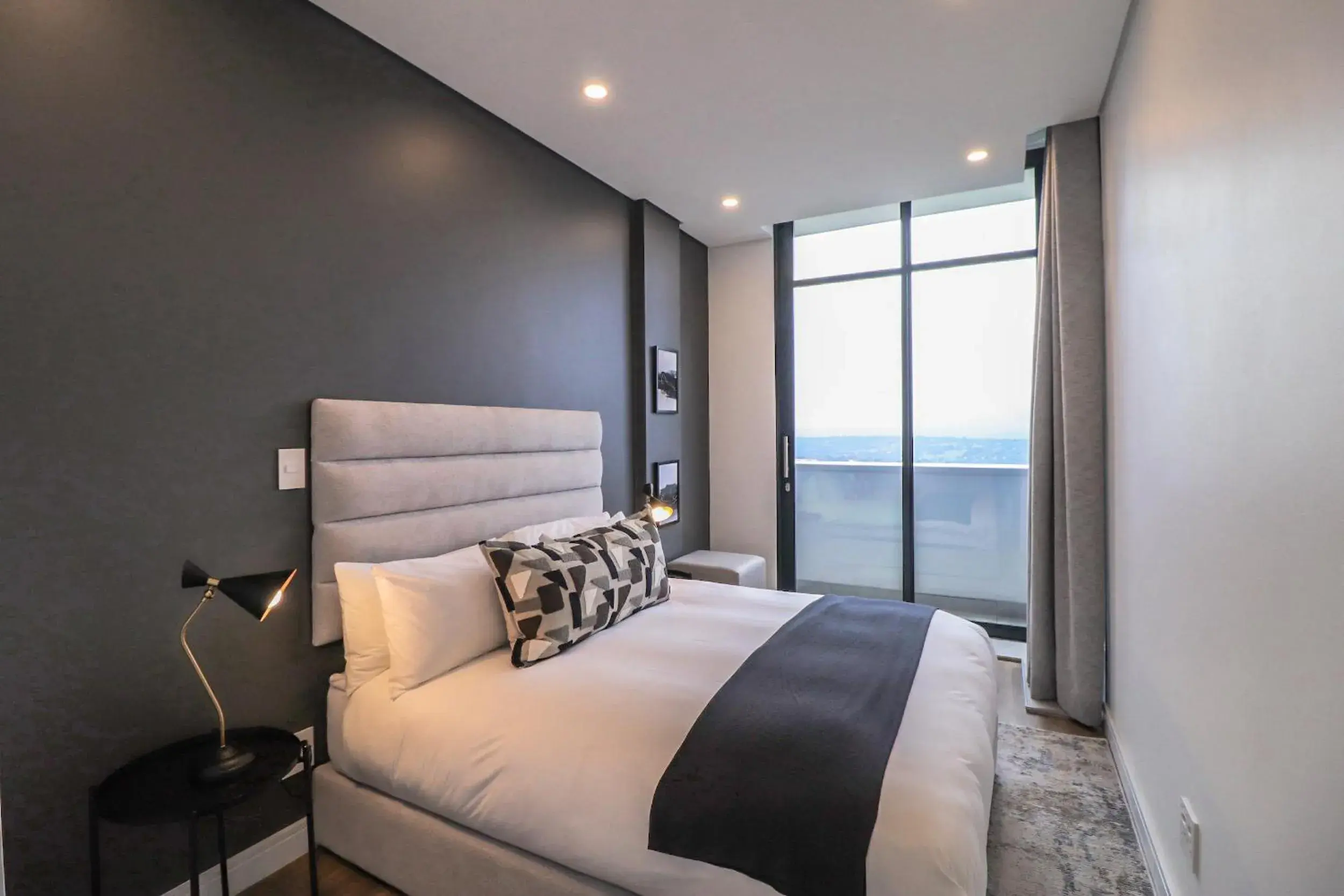 Balcony/Terrace, Bed in Reserved Suites Illovo Balcony/Terrace, Bed in Reserved Suites Illovo