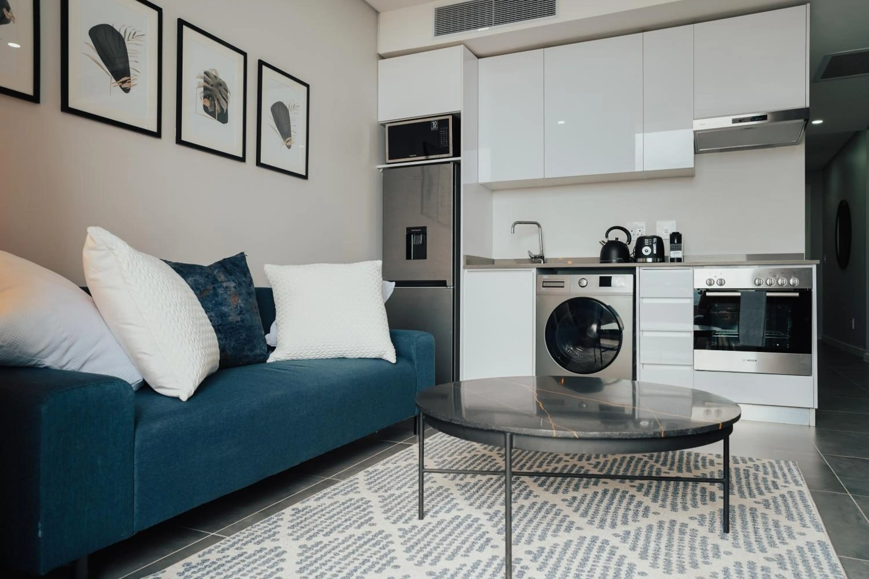 Kitchen or kitchenette in Reserved Suites Illovo