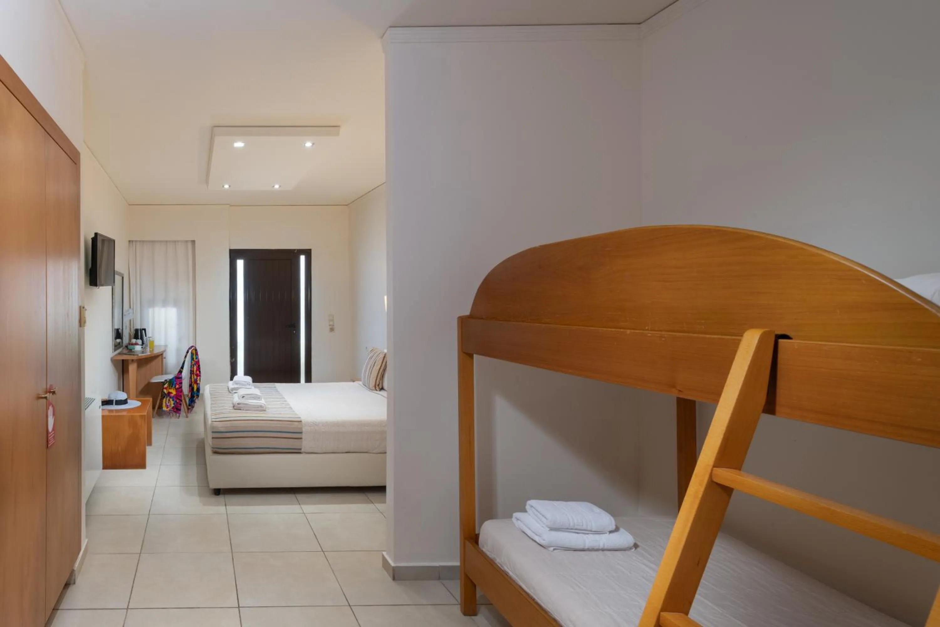 Bed in Themis Beach Hotel