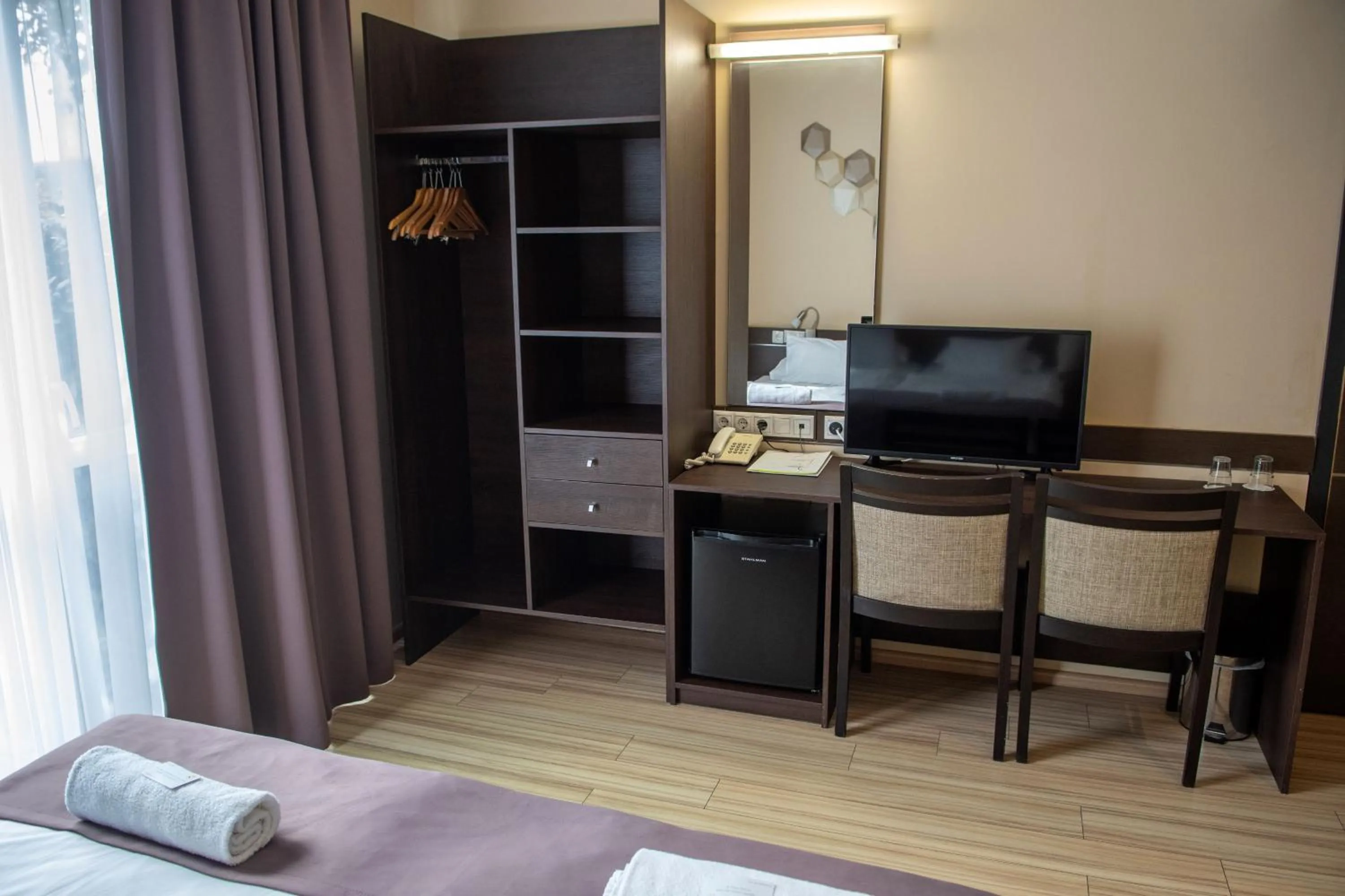 Bed in CE Plaza Hotel