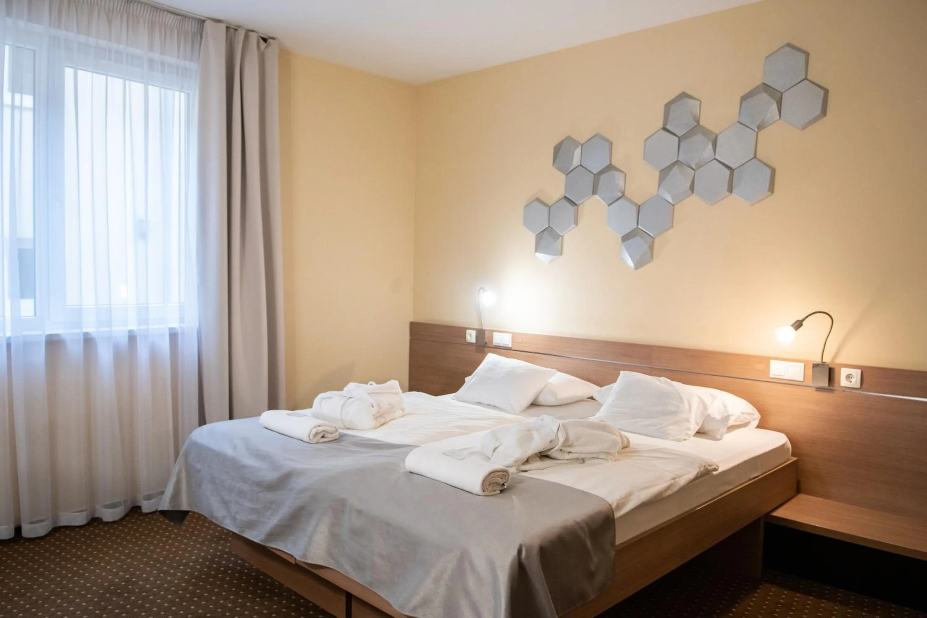 Bed in CE Plaza Hotel