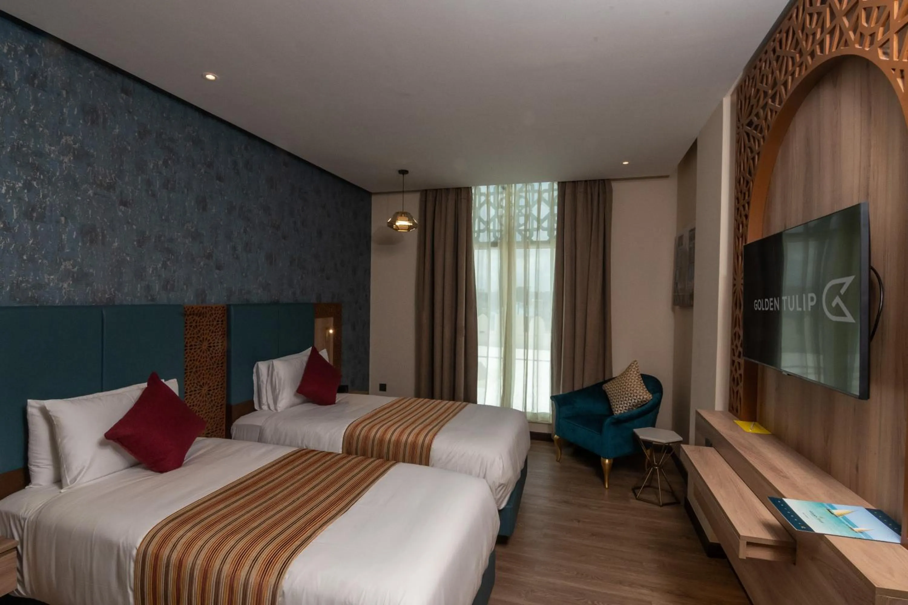 Quiet street view, Bed in Golden Tulip Zanzibar Airport Hotel & Spa