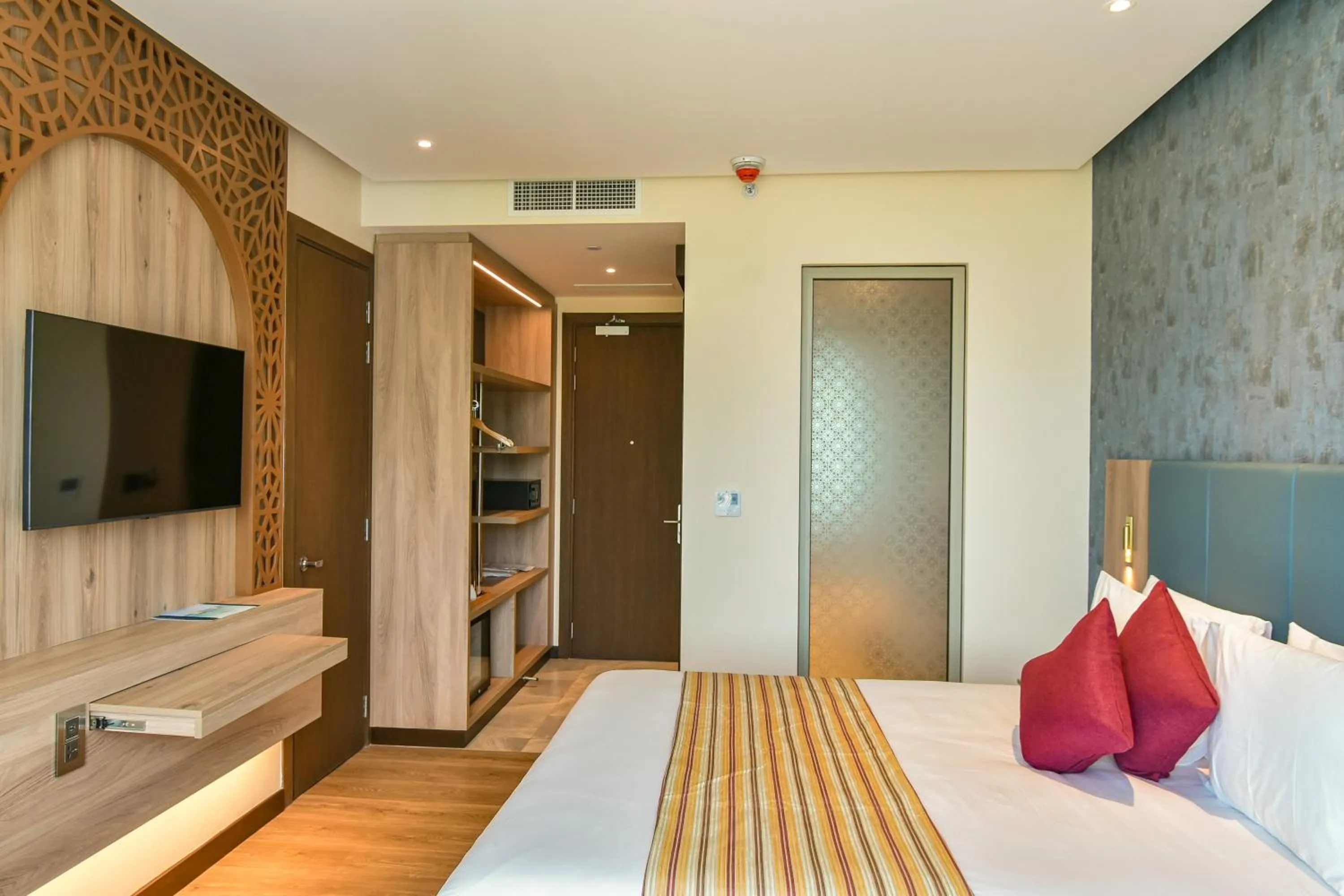 Photo of the whole room, Bed in Golden Tulip Zanzibar Airport Hotel & Spa