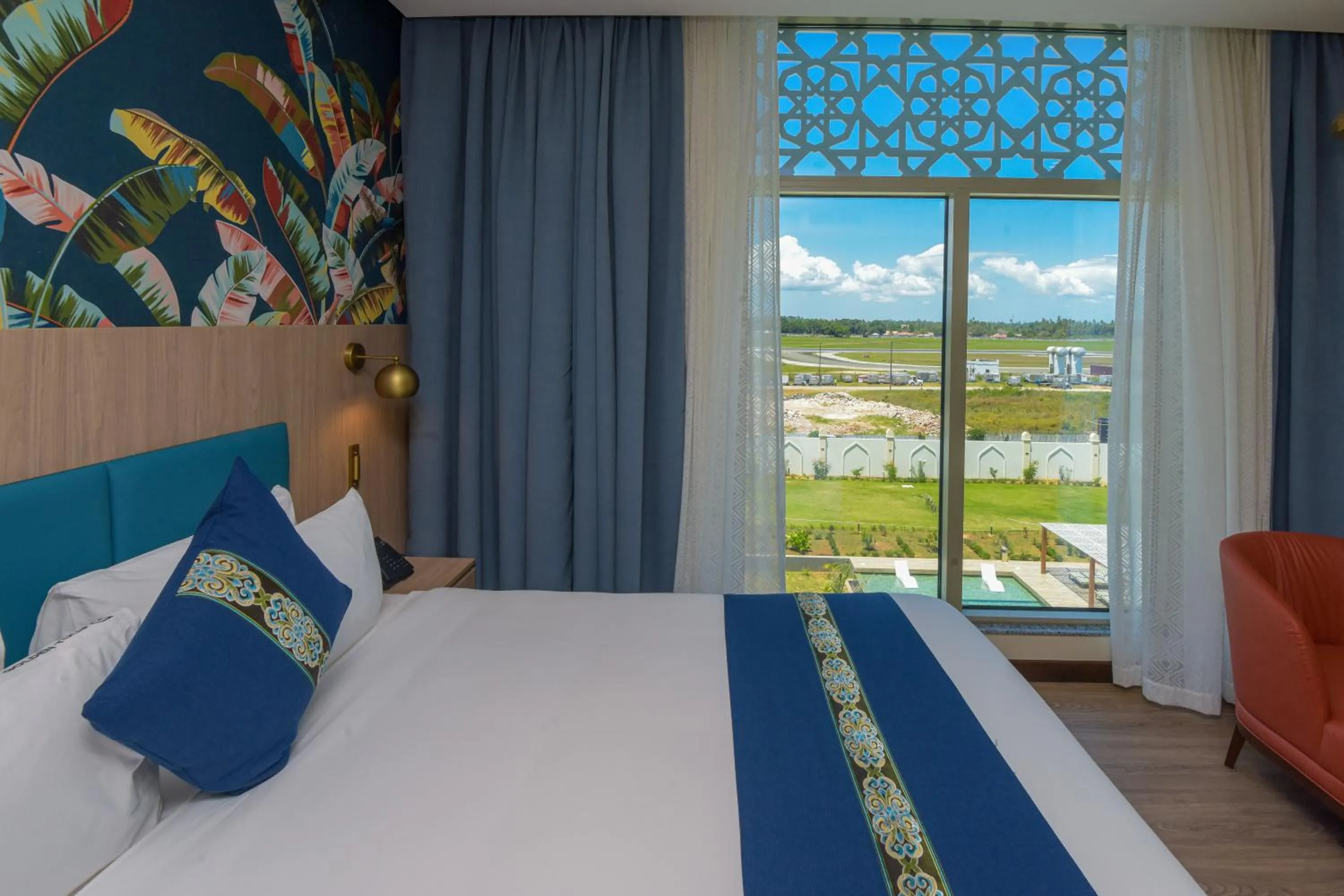 Photo of the whole room, Bed in Golden Tulip Zanzibar Airport Hotel & Spa