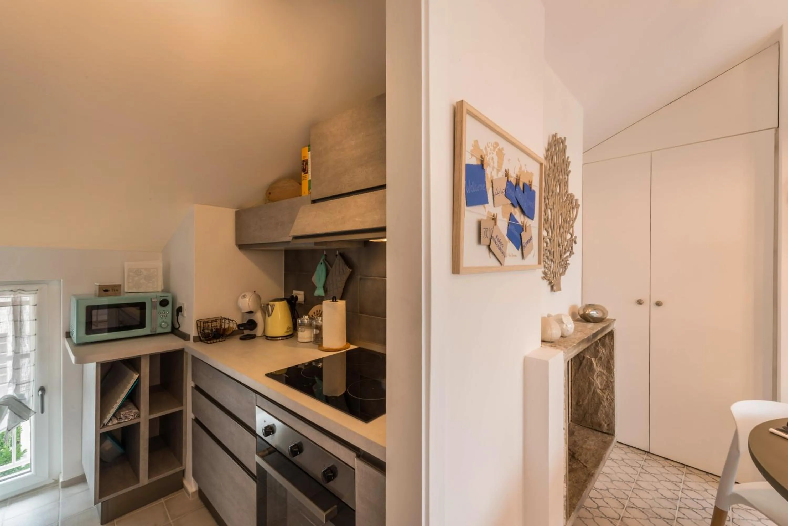 Kitchen or kitchenette in Casa Royale Appartamento Aria