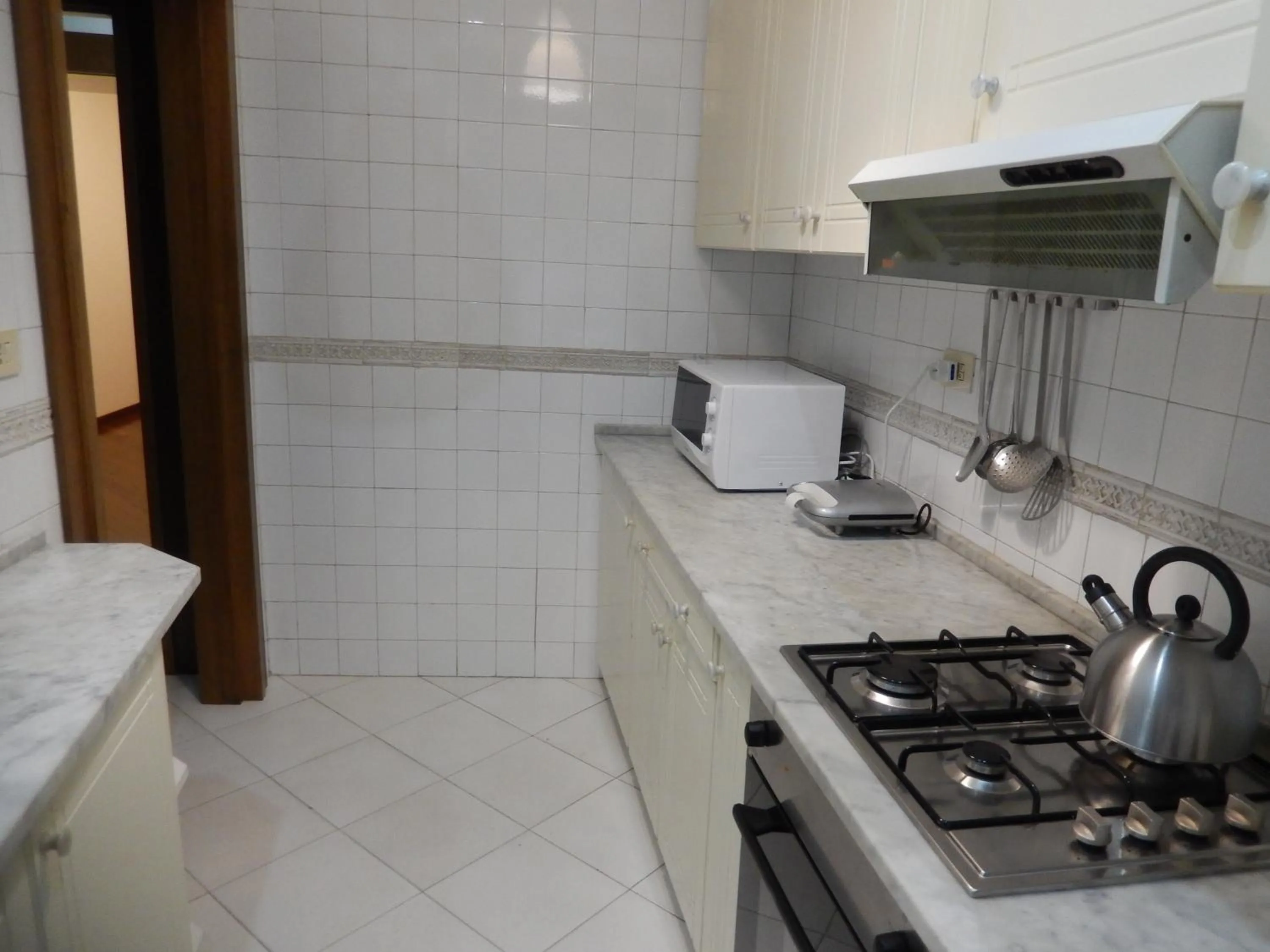 Kitchen or kitchenette in Colosseo Homerents 2