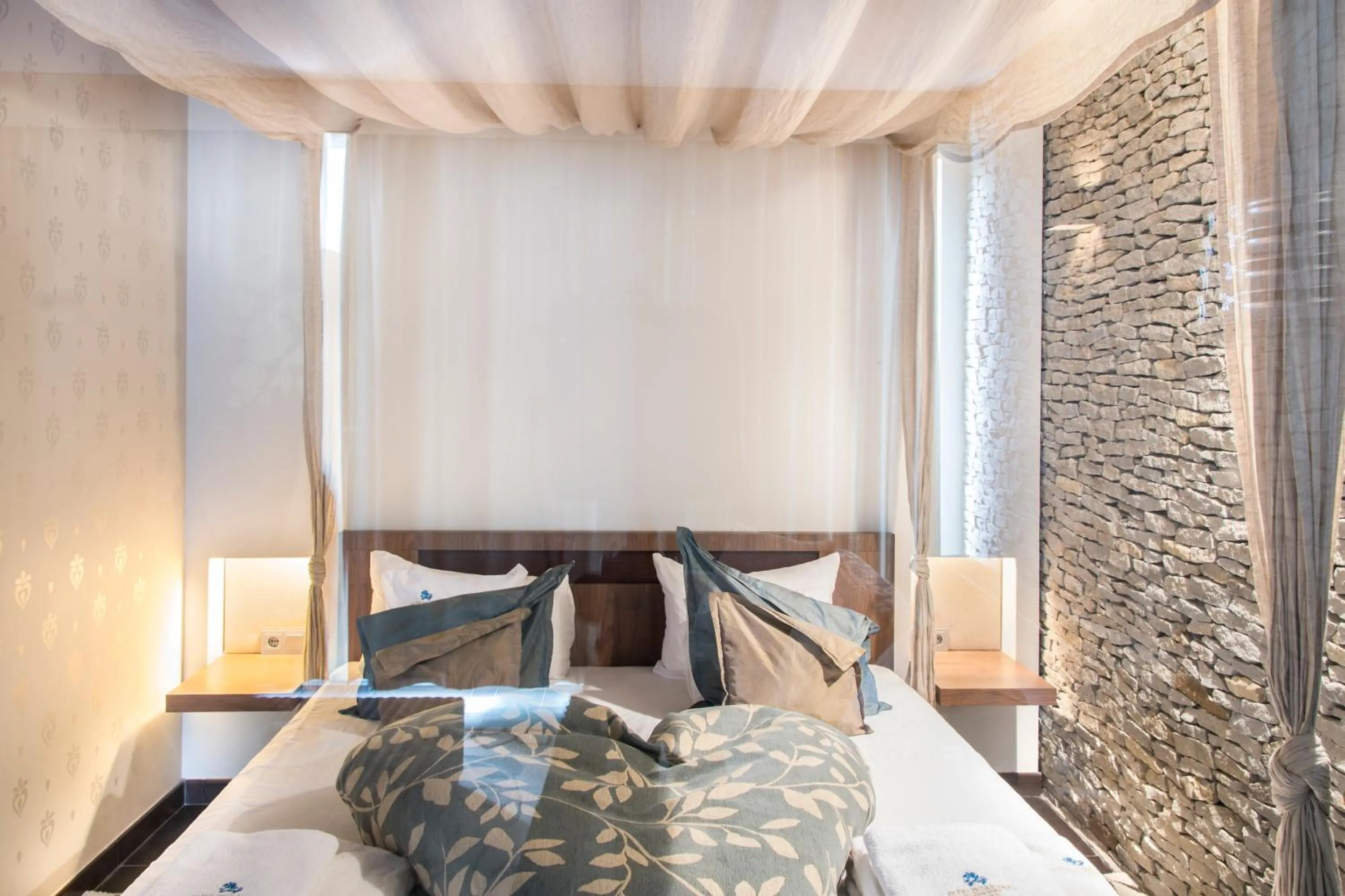 Bedroom in Echo Residence All Suite Hotel