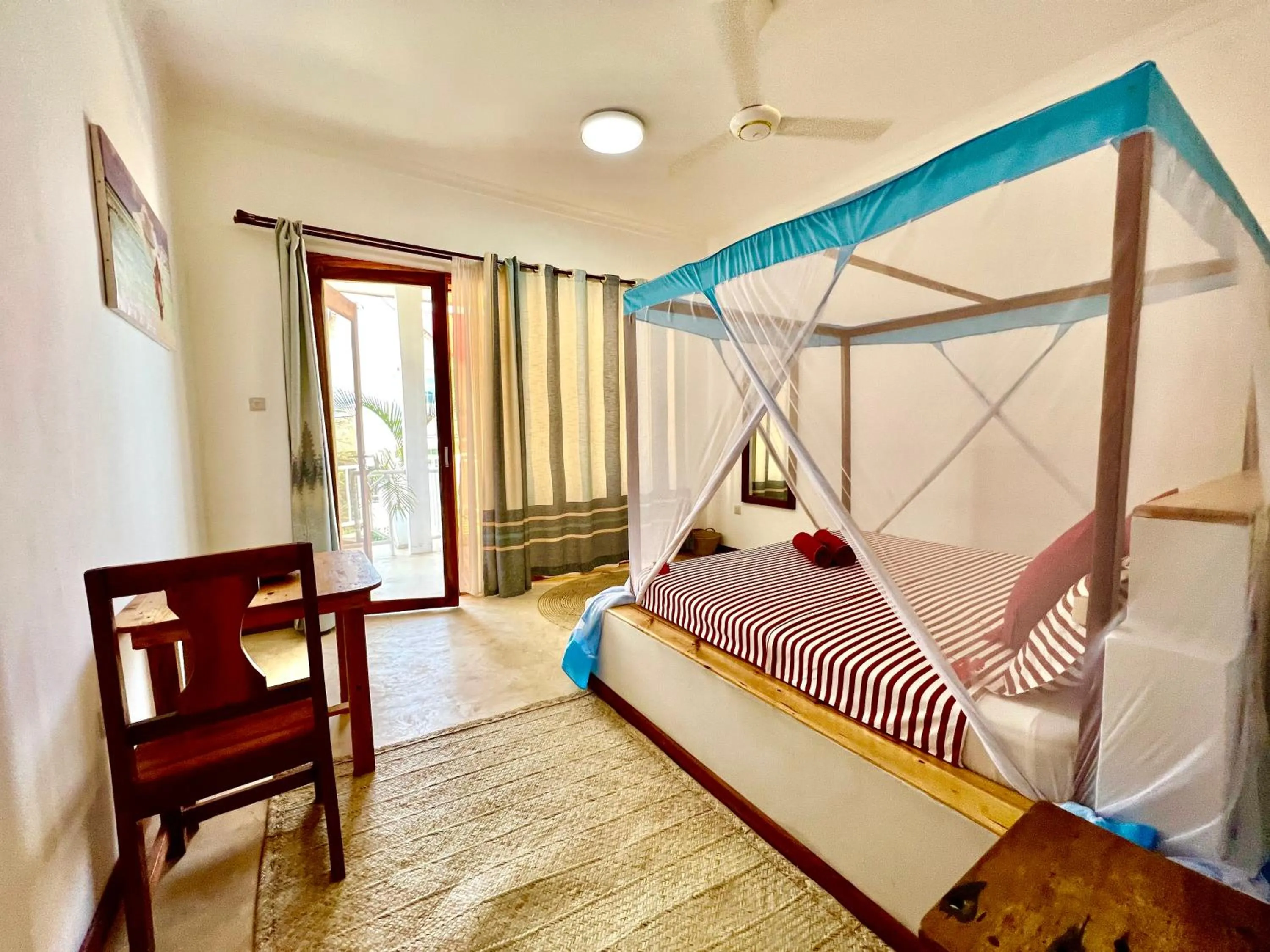 Bed in Chikachika Beach B&B