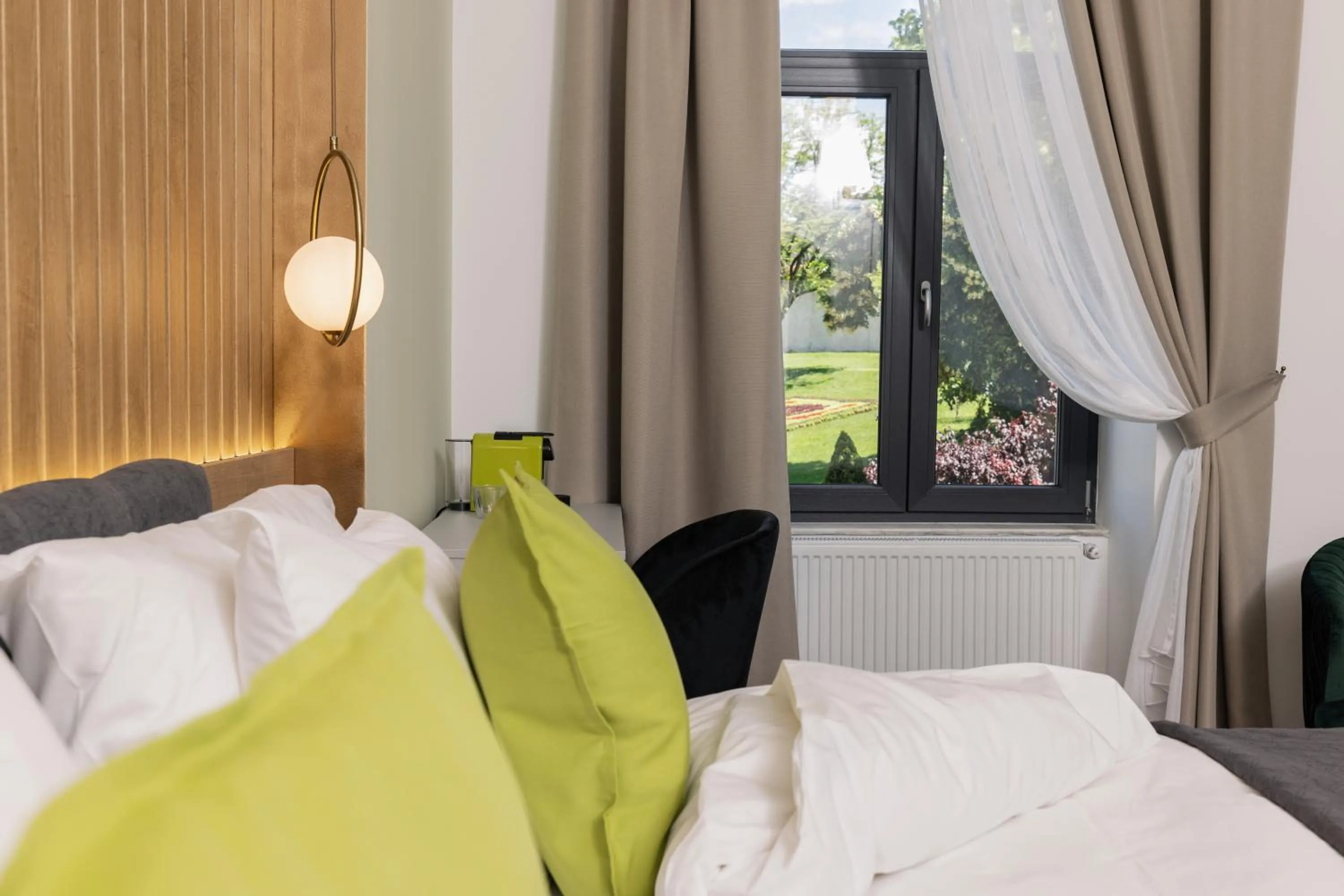 Photo of the whole room, Bed in Haller Boutique