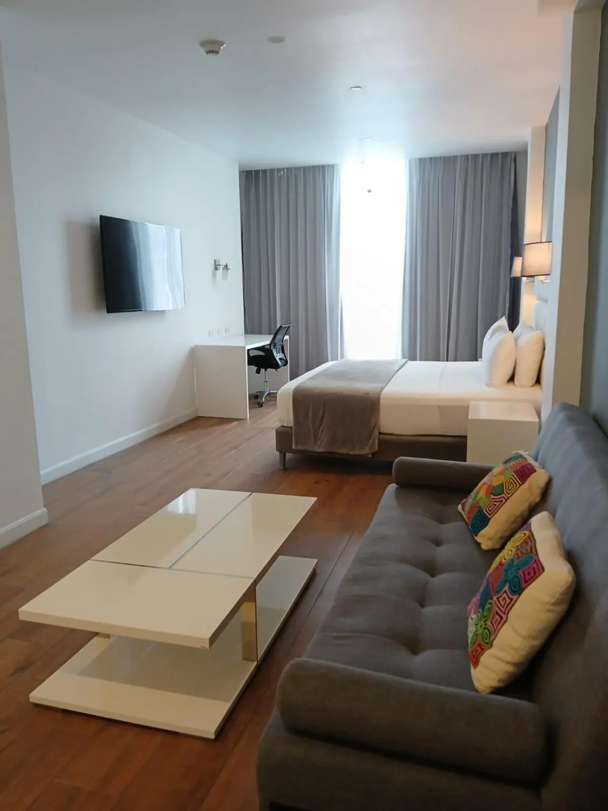 Living room, Bed in Hotel Mio Panamá