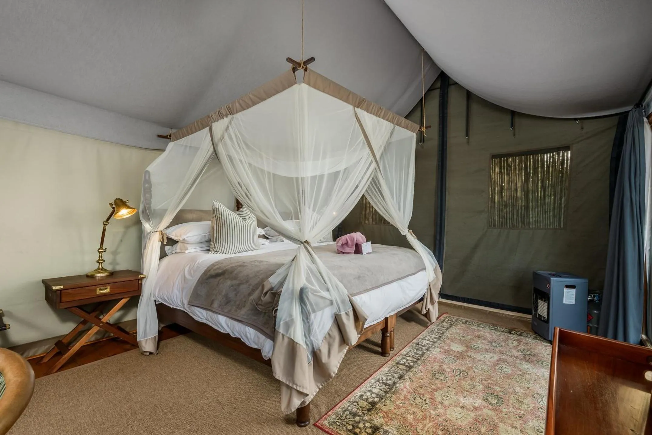 Bed in Camp Figtree by The Oyster Collection