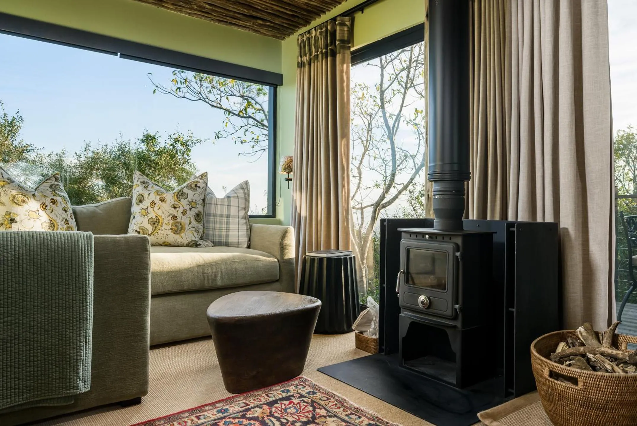 Living room in Camp Figtree by The Oyster Collection