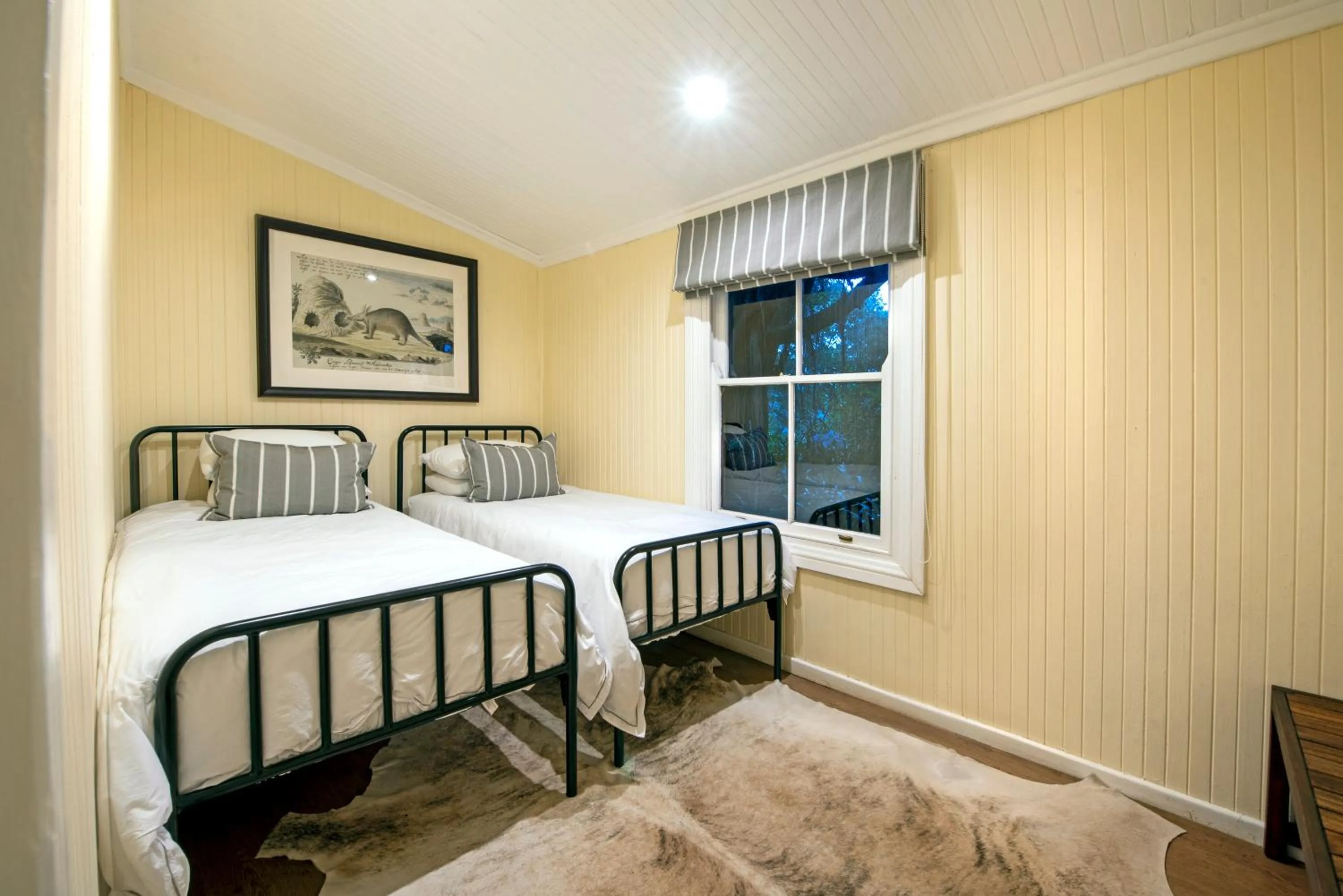 Bed in Camp Figtree by The Oyster Collection