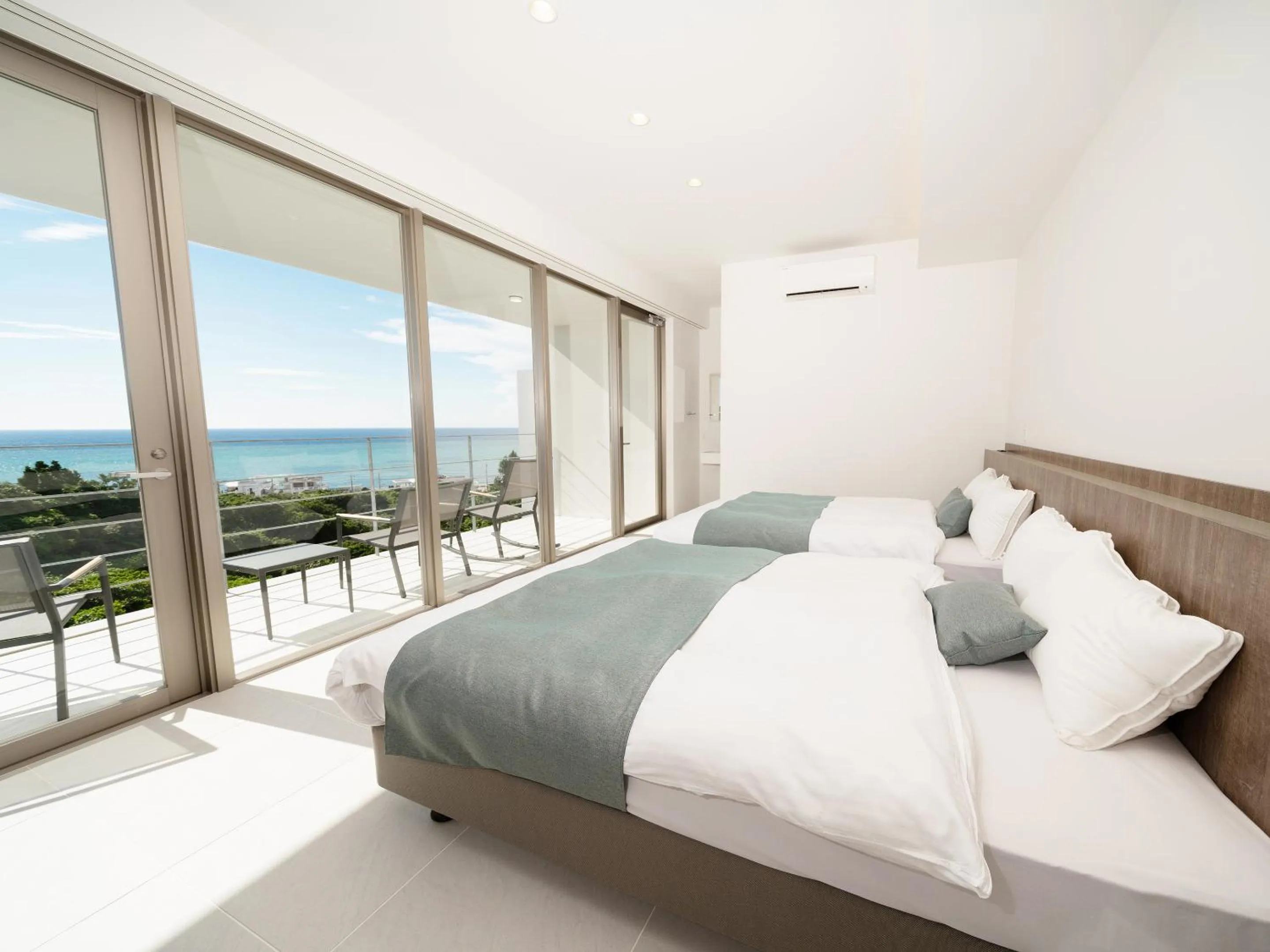 Photo of the whole room, Bed in Blue Rela Luxe Resort Okinawa