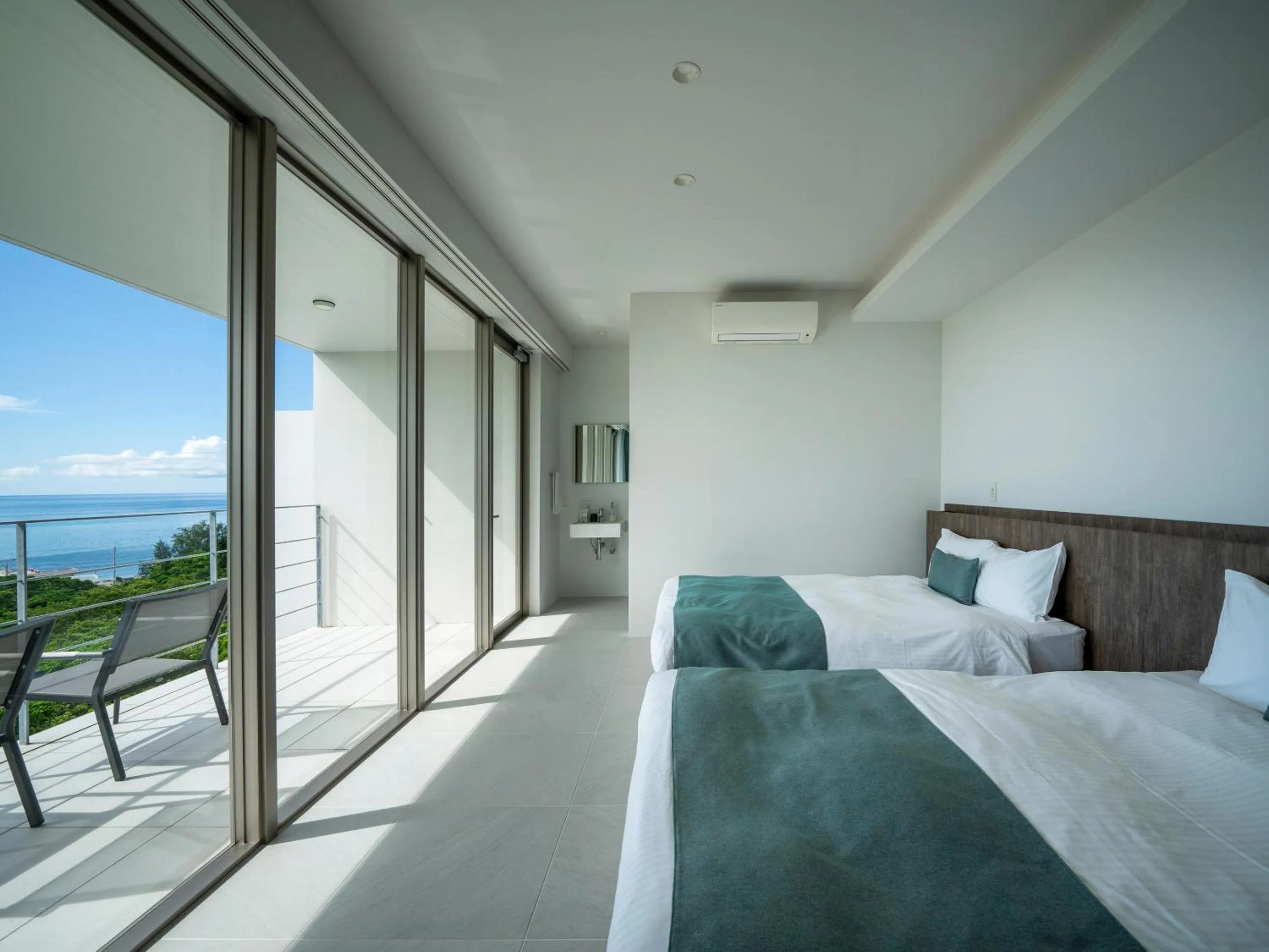 Photo of the whole room, Bed in Blue Rela Luxe Resort Okinawa