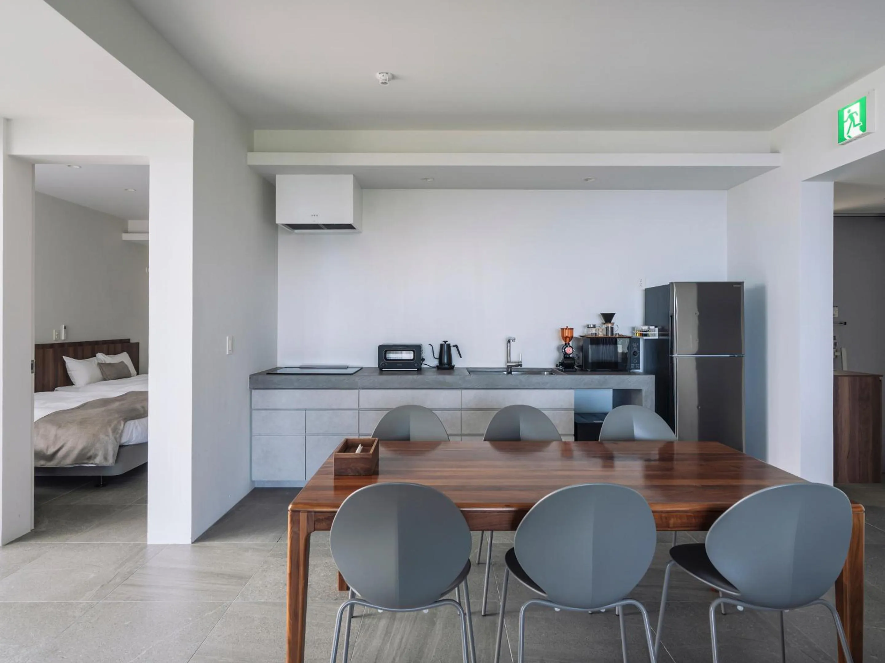 Bed in Blue Rela Luxe Resort Okinawa