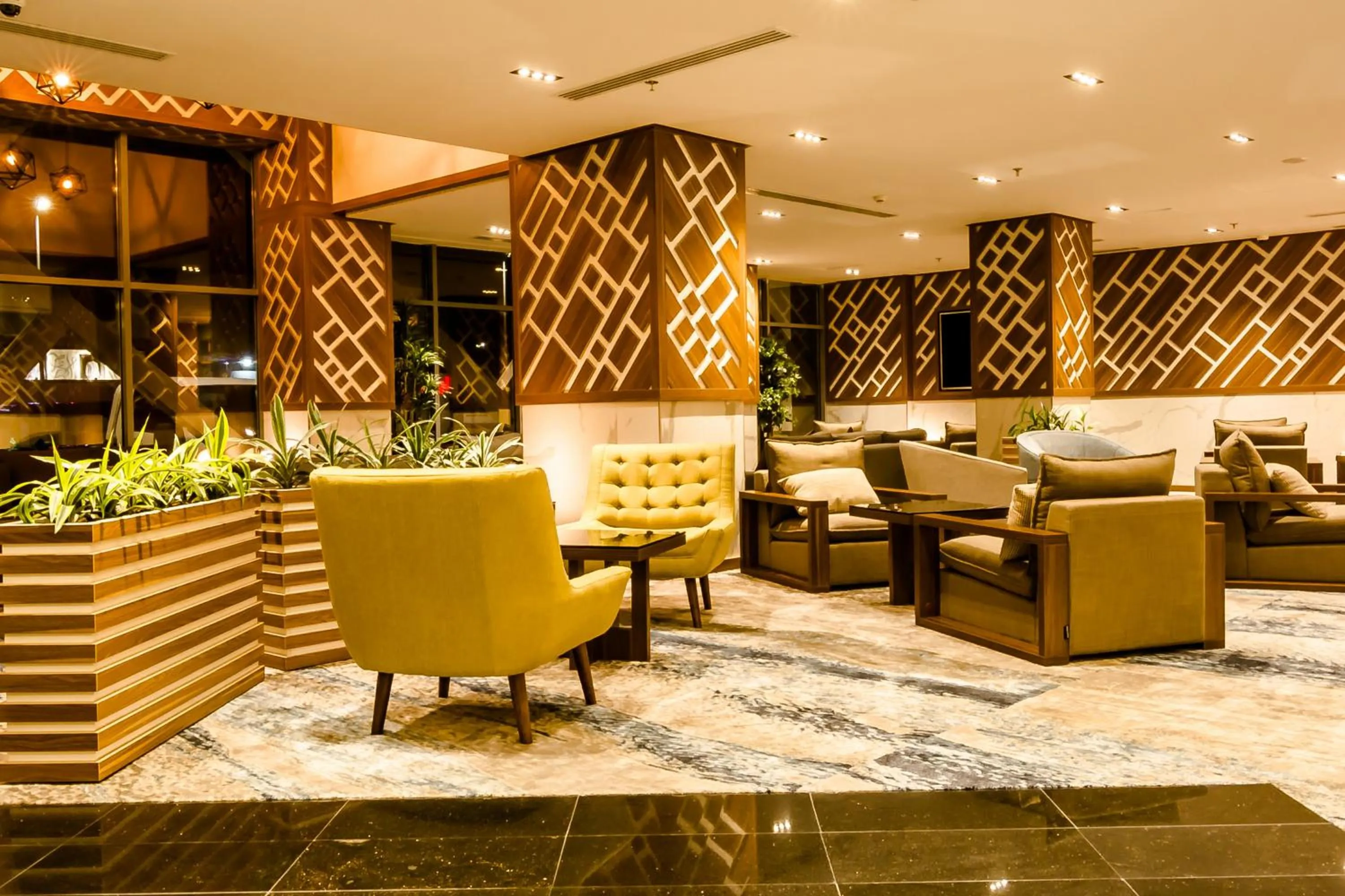 Lounge or bar in White Diamond Hotel Sari