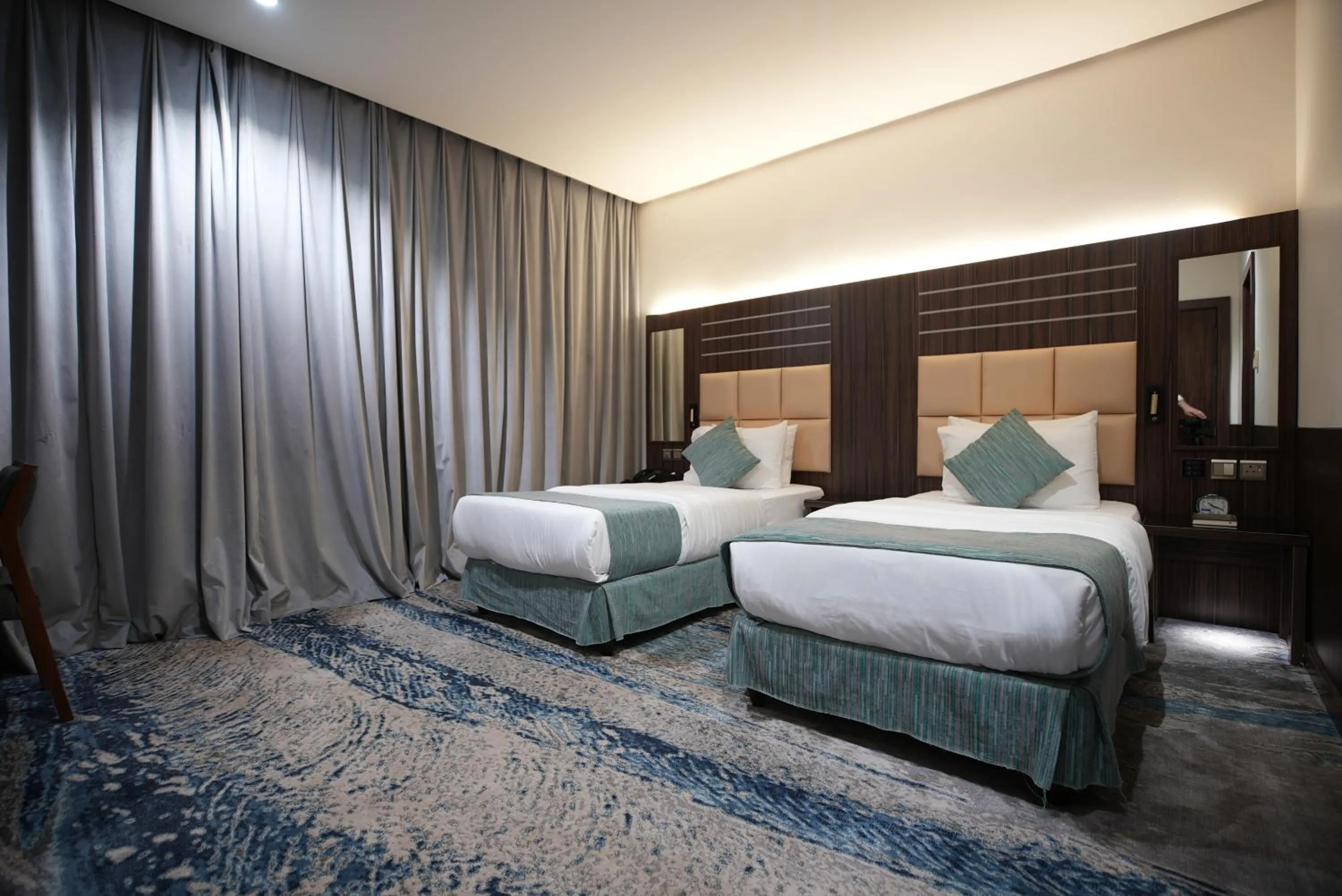 Bed in White Diamond Hotel Sari