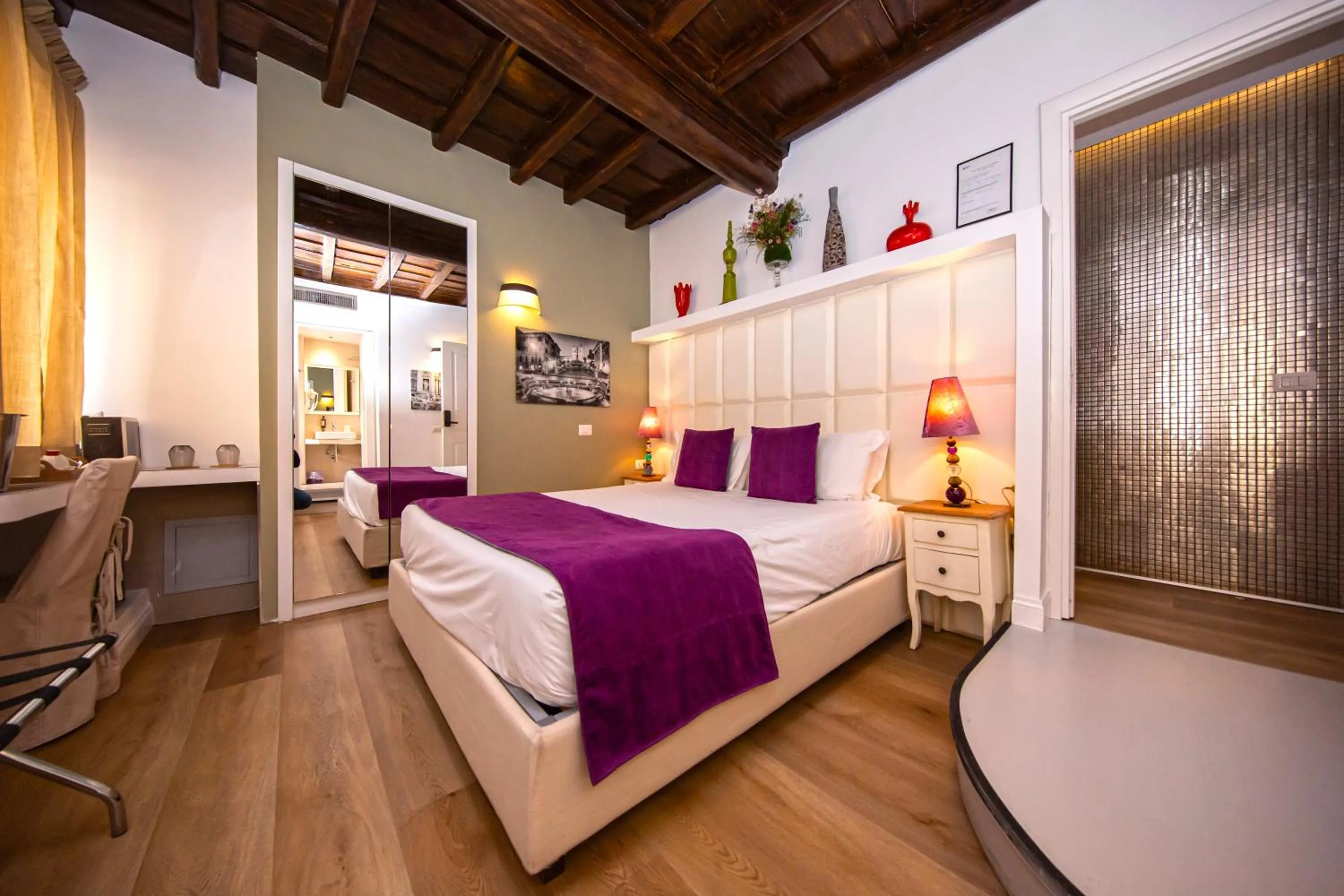 Bed in Corso Suite 107 Rooms Wellness & Spa