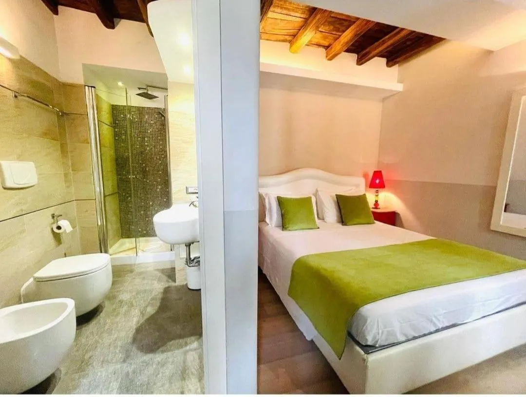 Bathroom, Bed in Corso Suite 107 Rooms Wellness & Spa