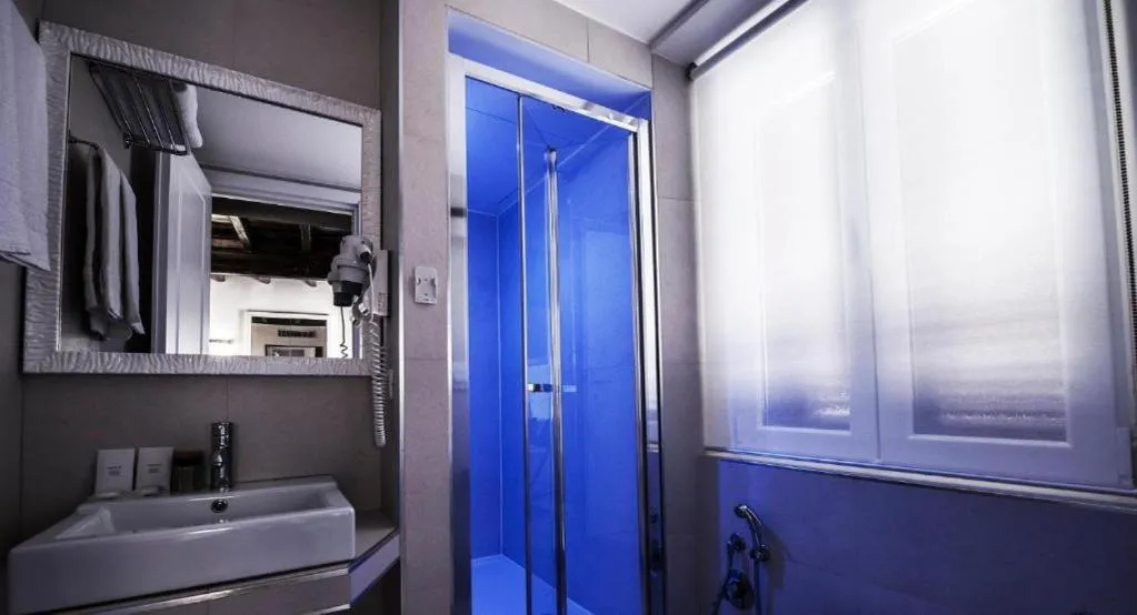 Bathroom in Corso Suite 107 Rooms Wellness & Spa