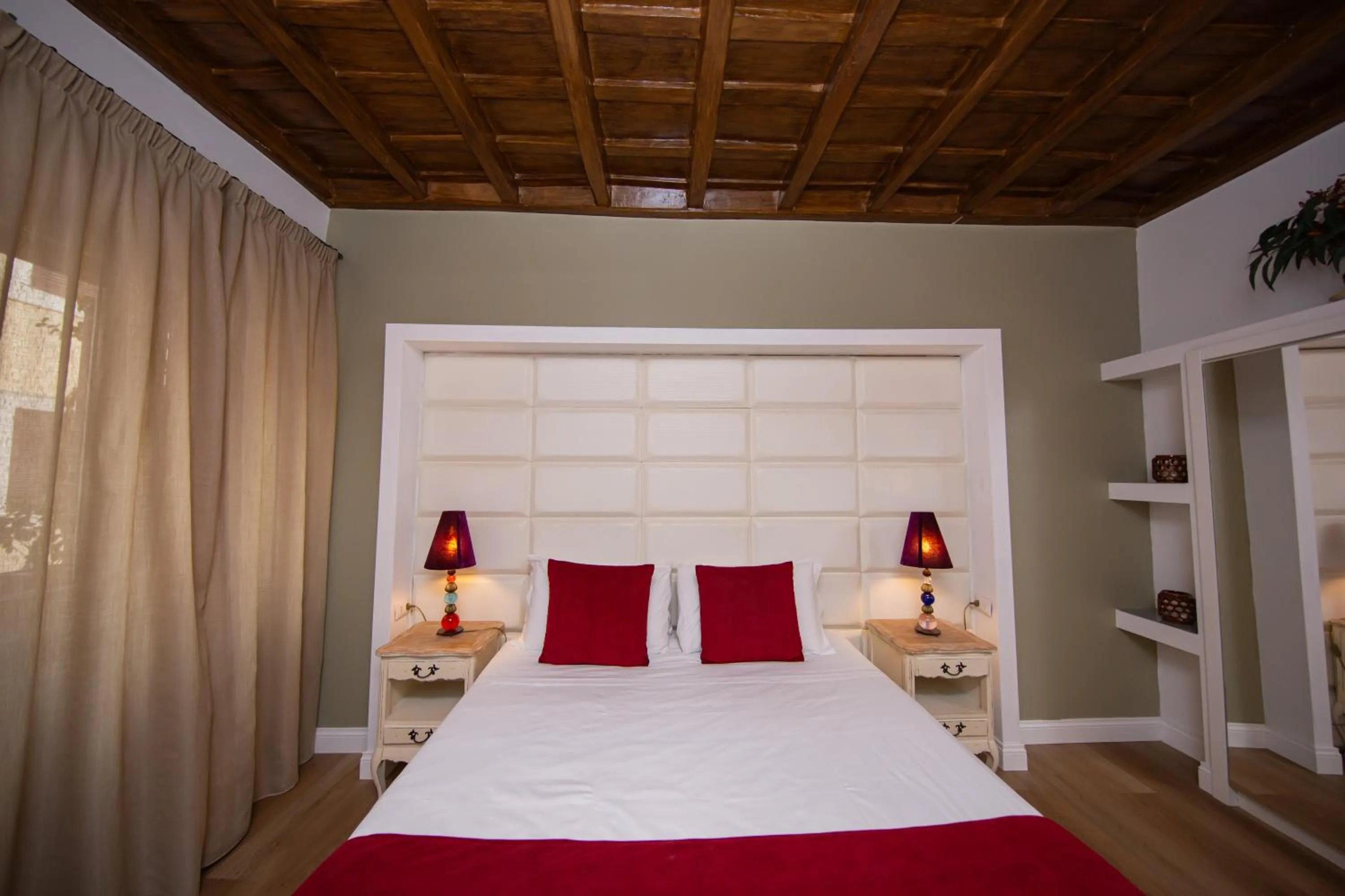 Bed in Corso Suite 107 Rooms Wellness & Spa
