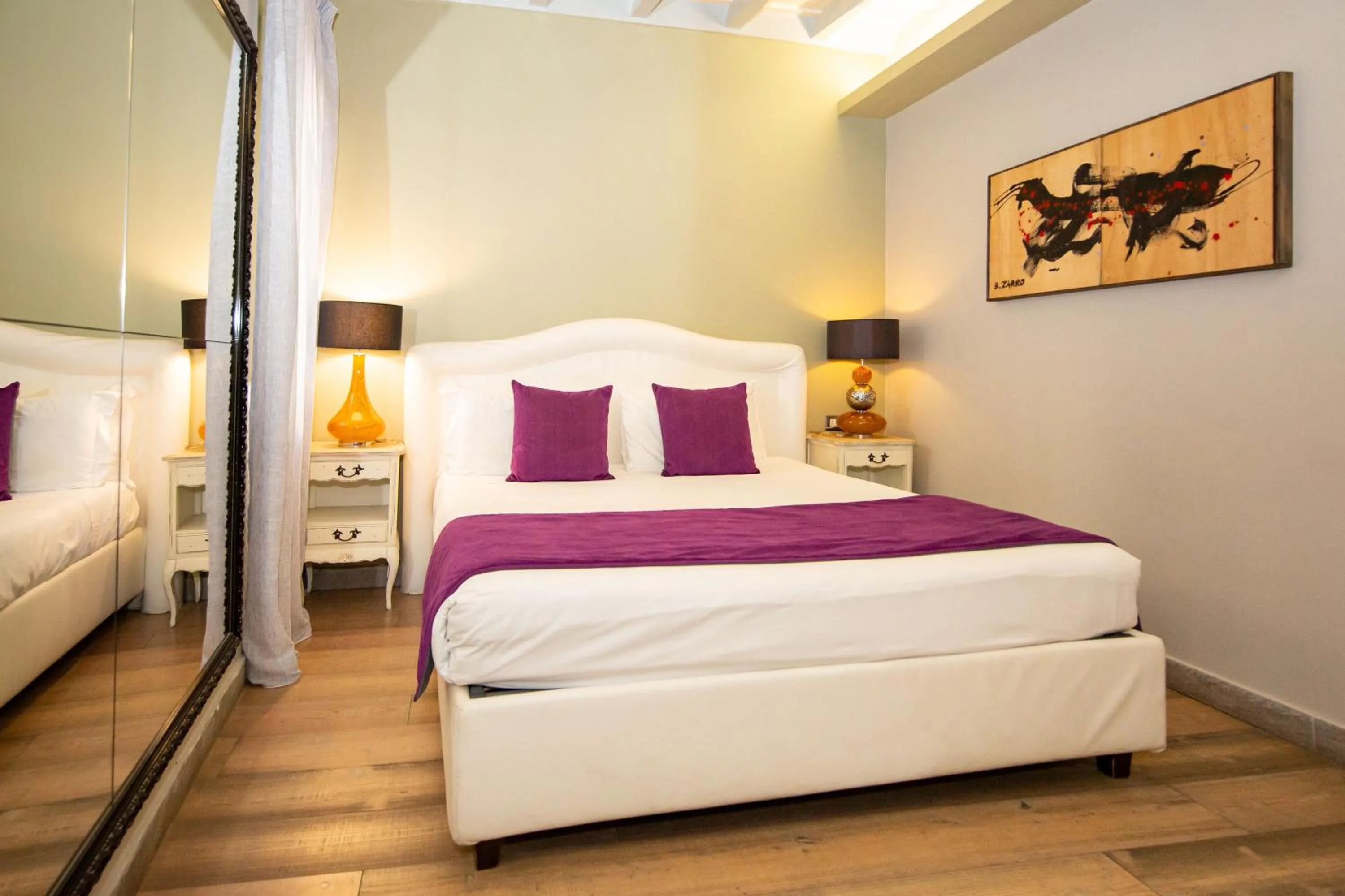 Bed in Corso Suite 107 Rooms Wellness & Spa