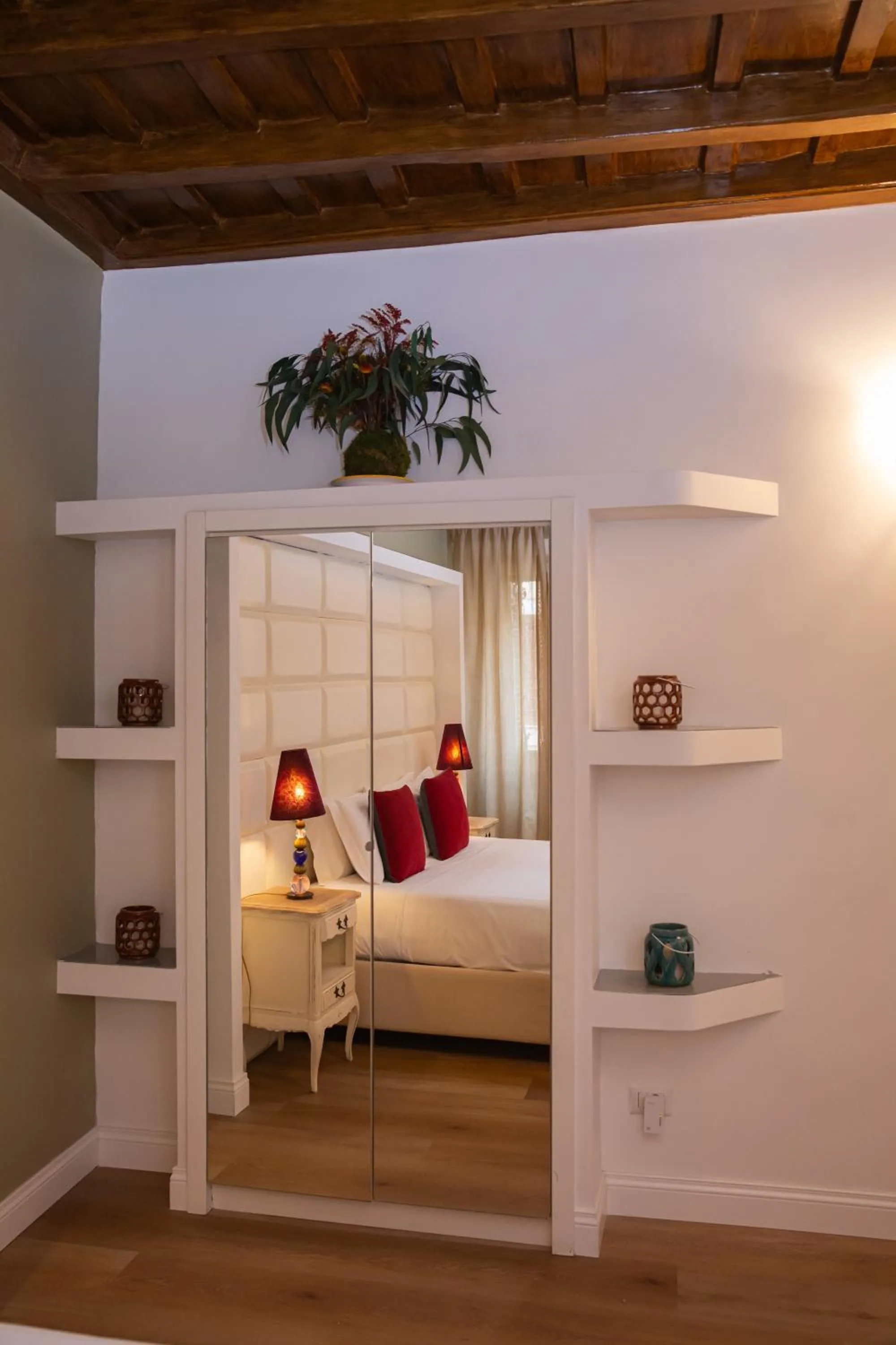 Bed in Corso Suite 107 Rooms Wellness & Spa