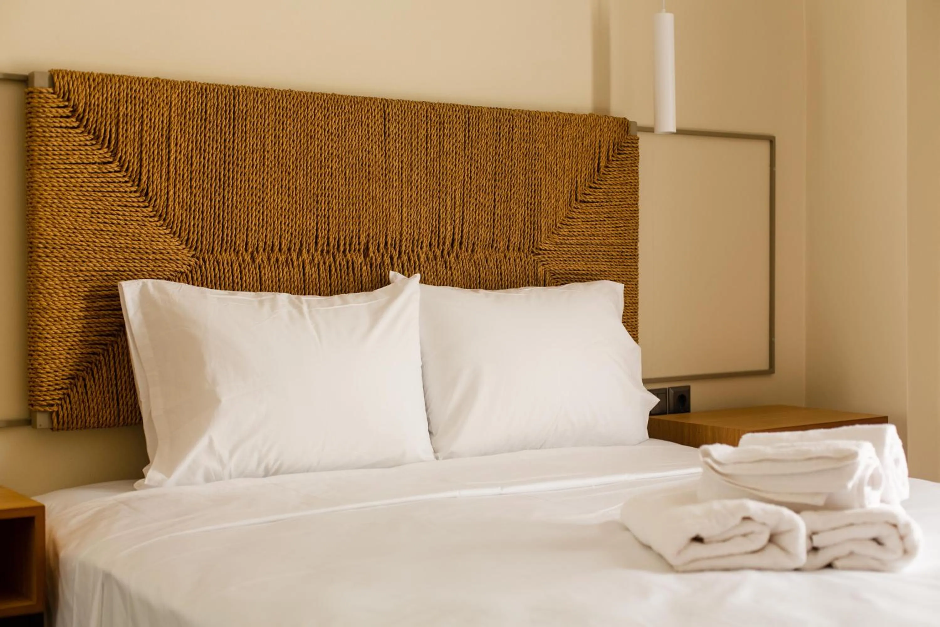 Bed in Leone Suites