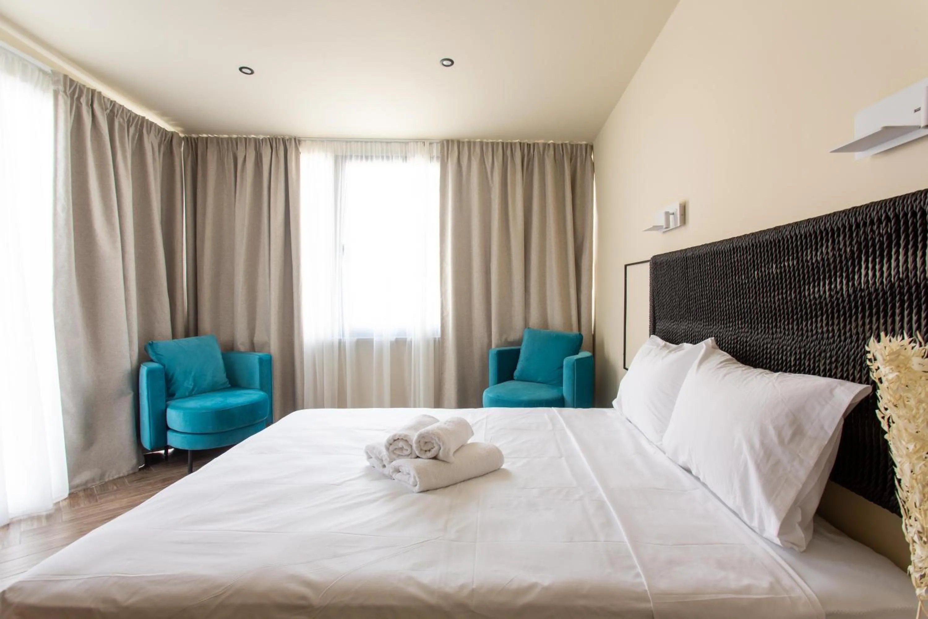 Bed in Leone Suites