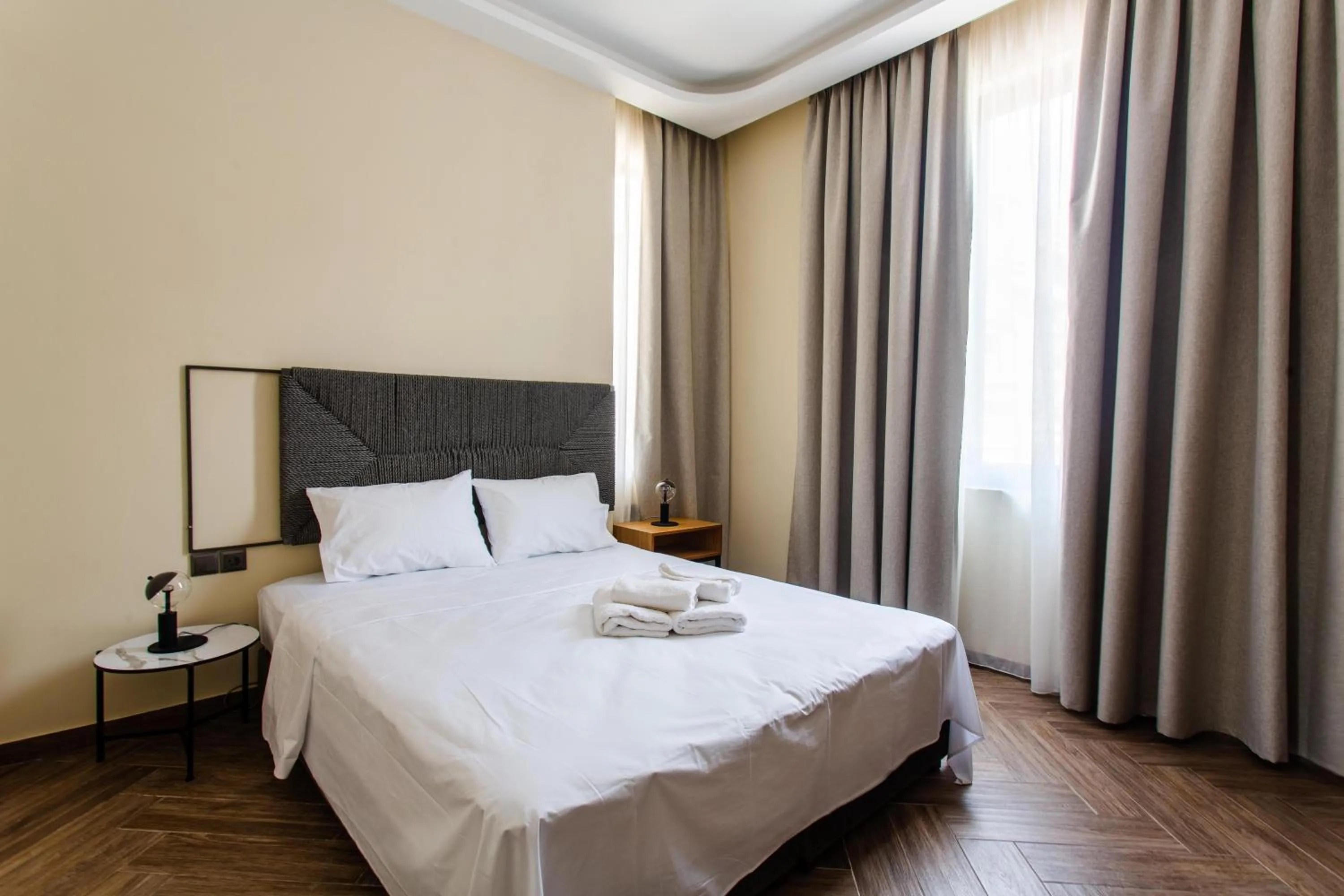 Bed in Leone Suites