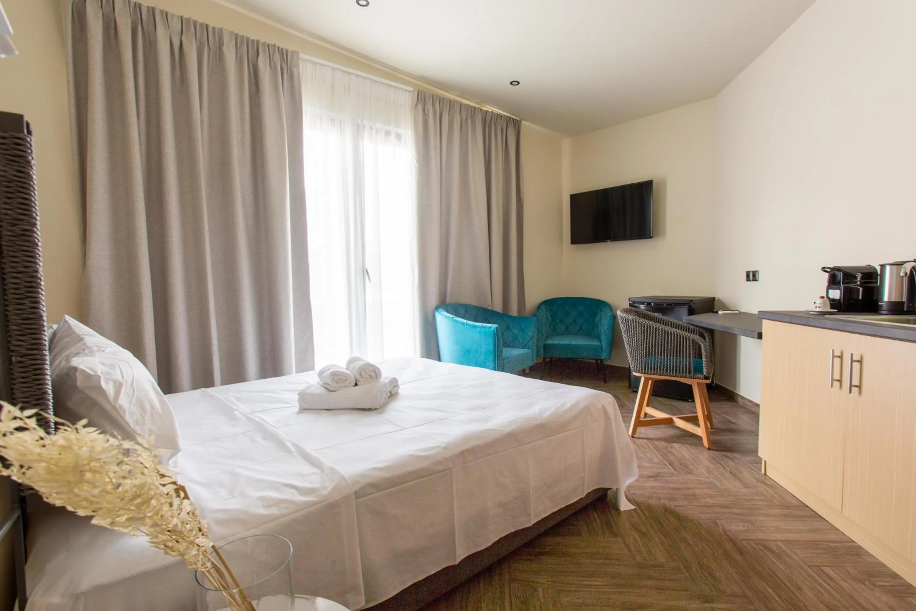 Bed in Leone Suites