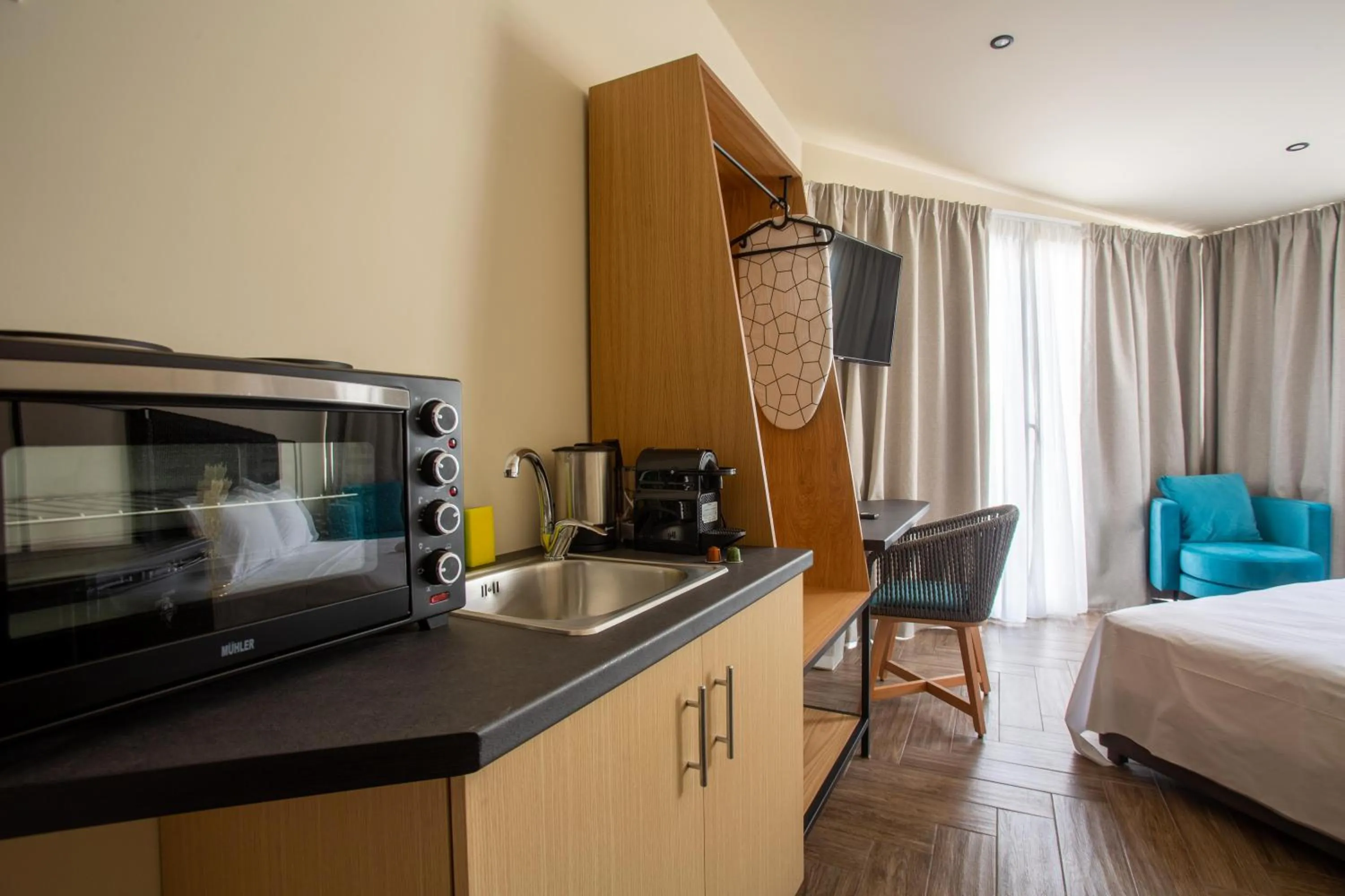 Bed in Leone Suites