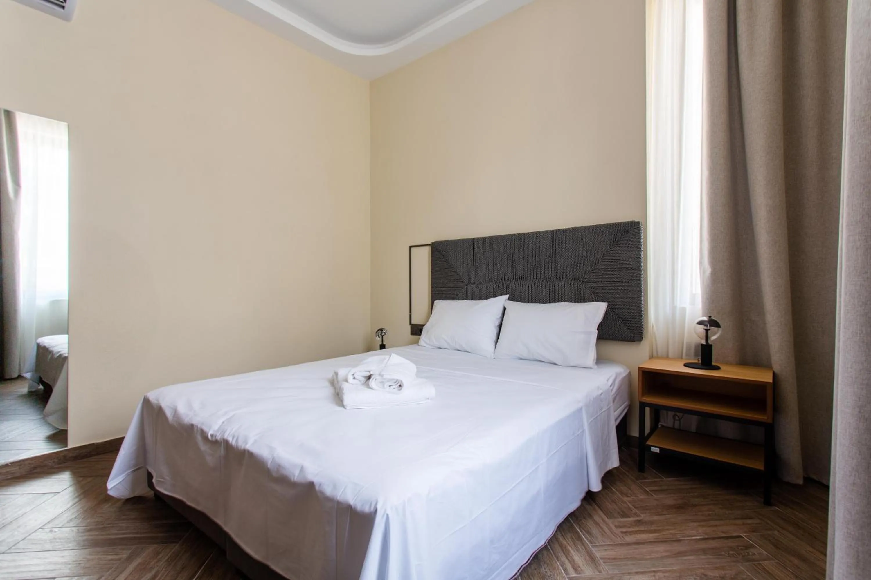 Bed in Leone Suites
