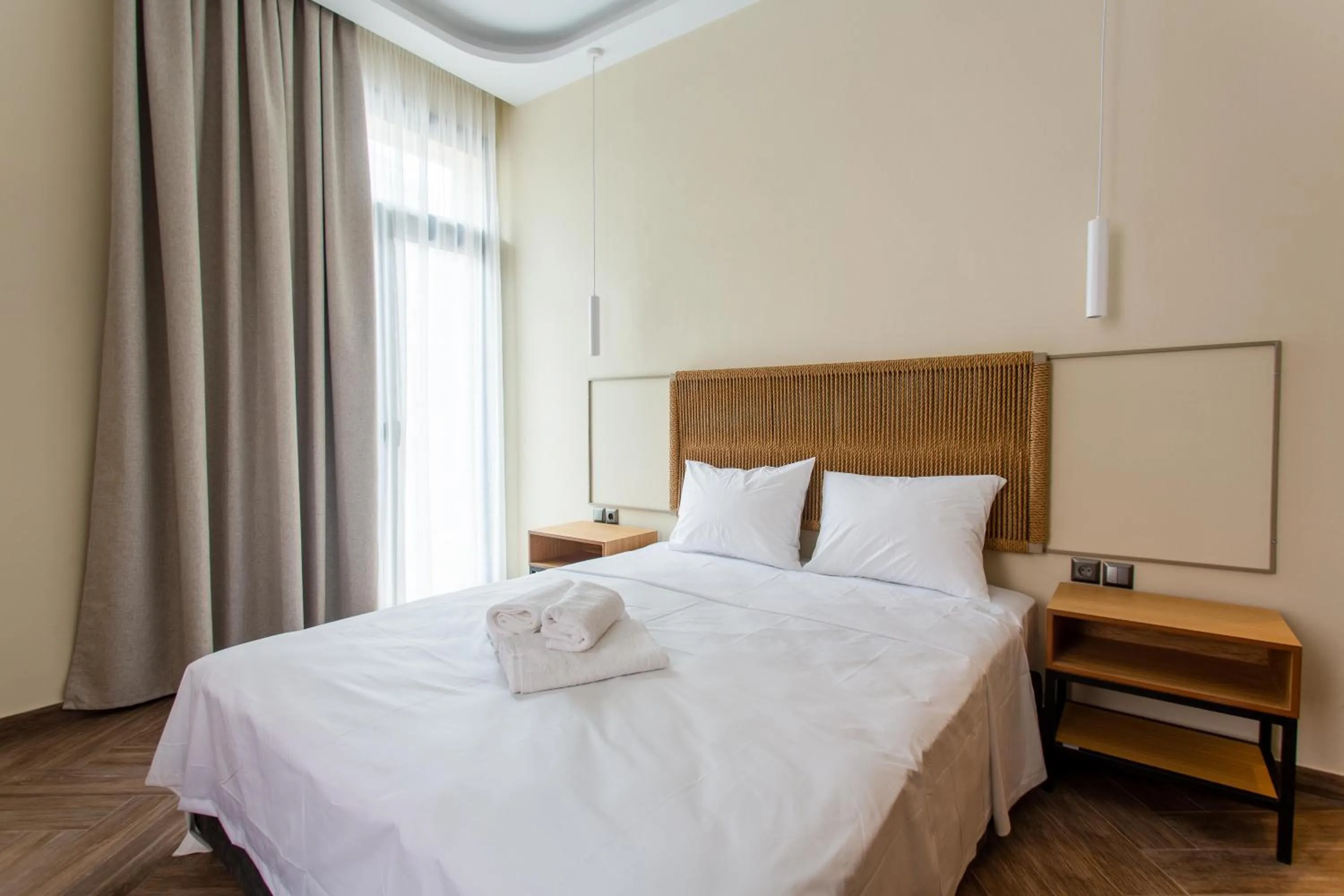 Bed in Leone Suites