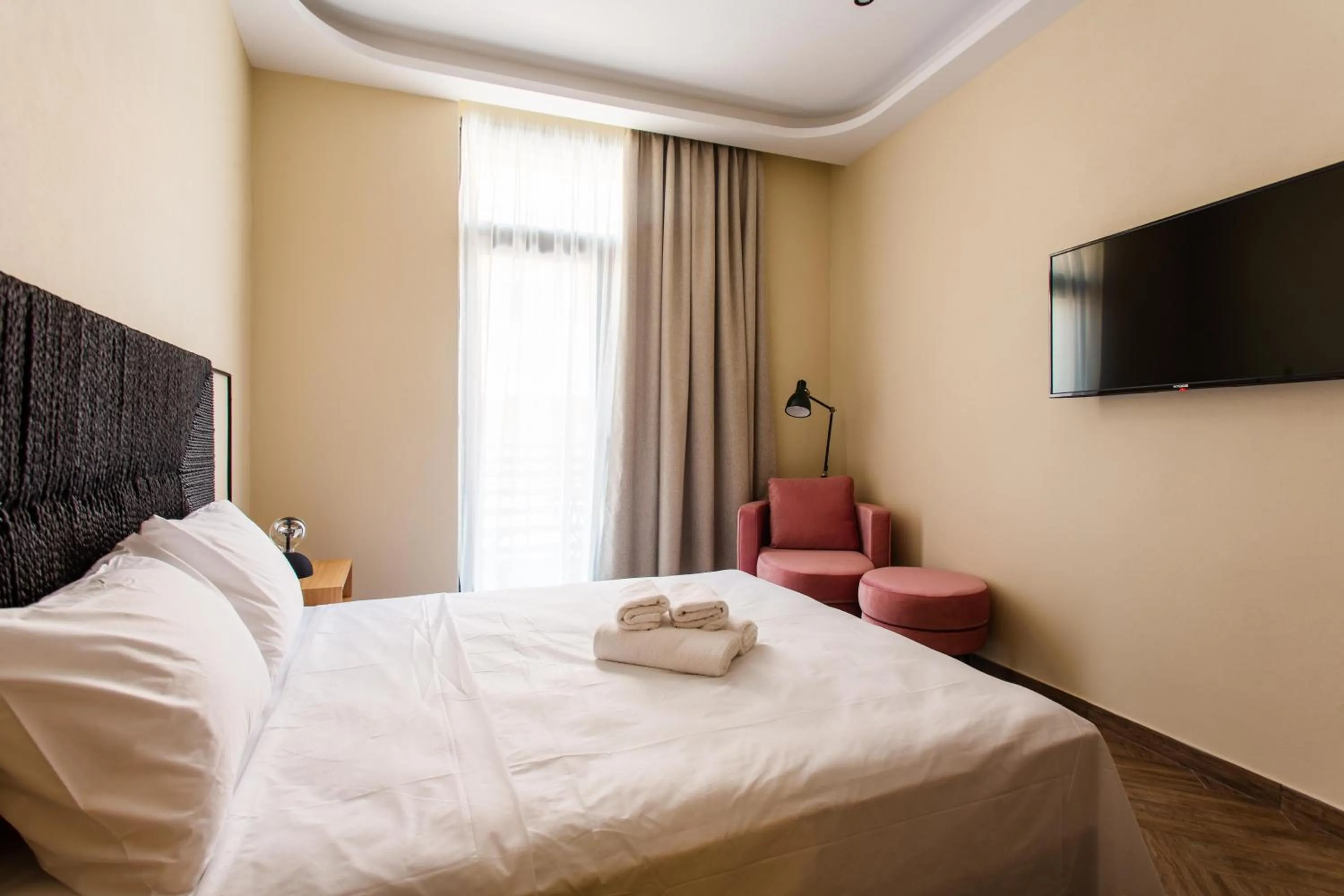 Bed in Leone Suites