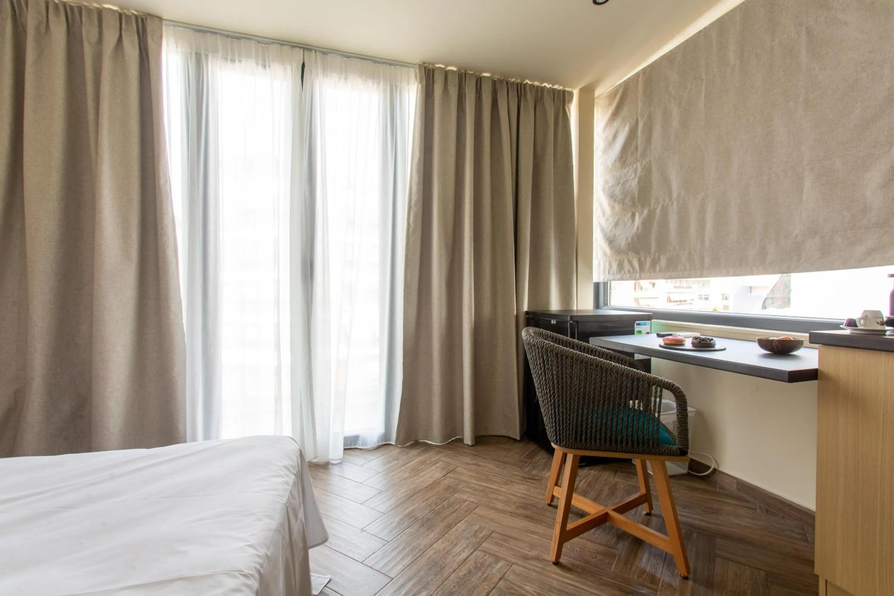 Bed in Leone Suites