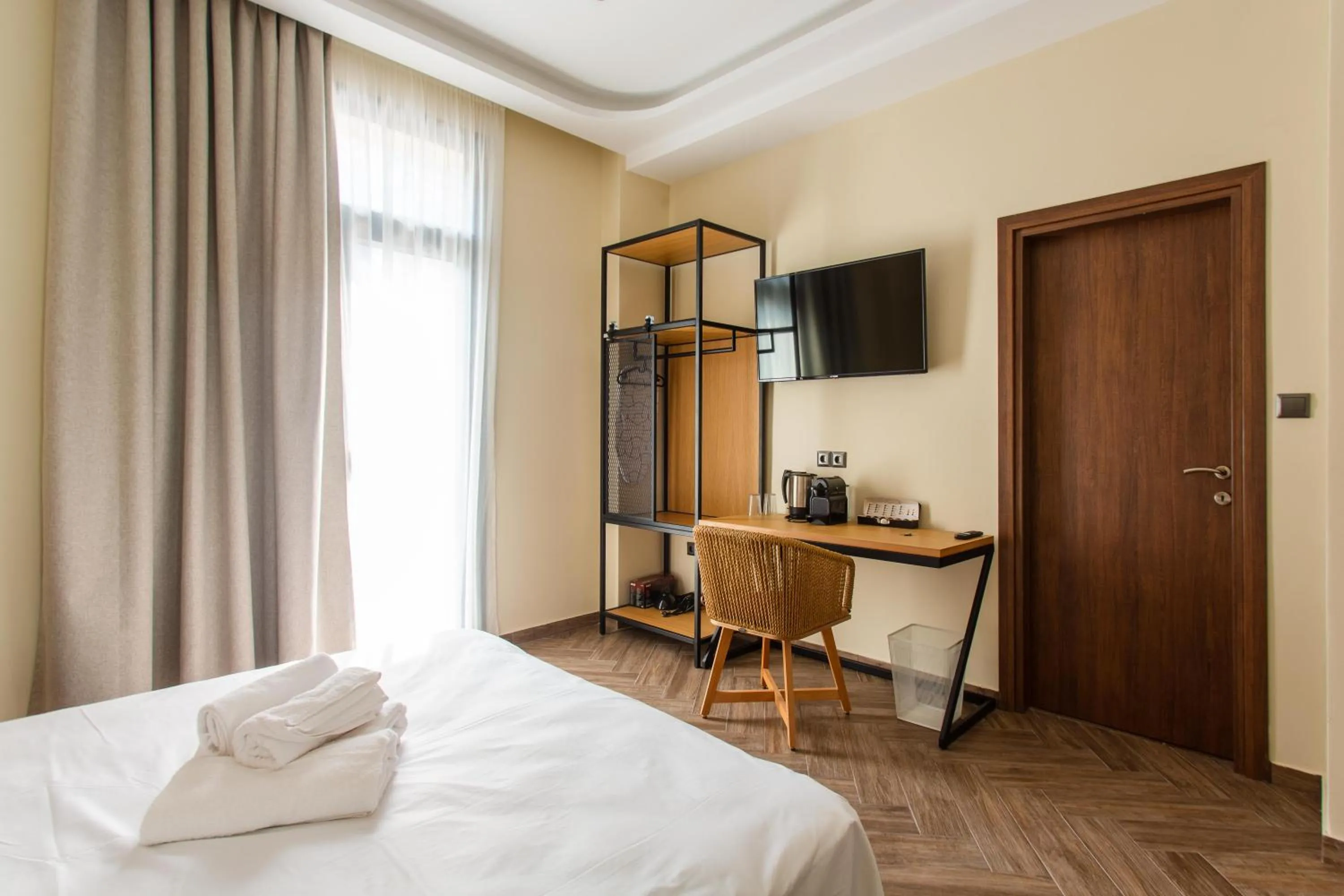 Bed in Leone Suites