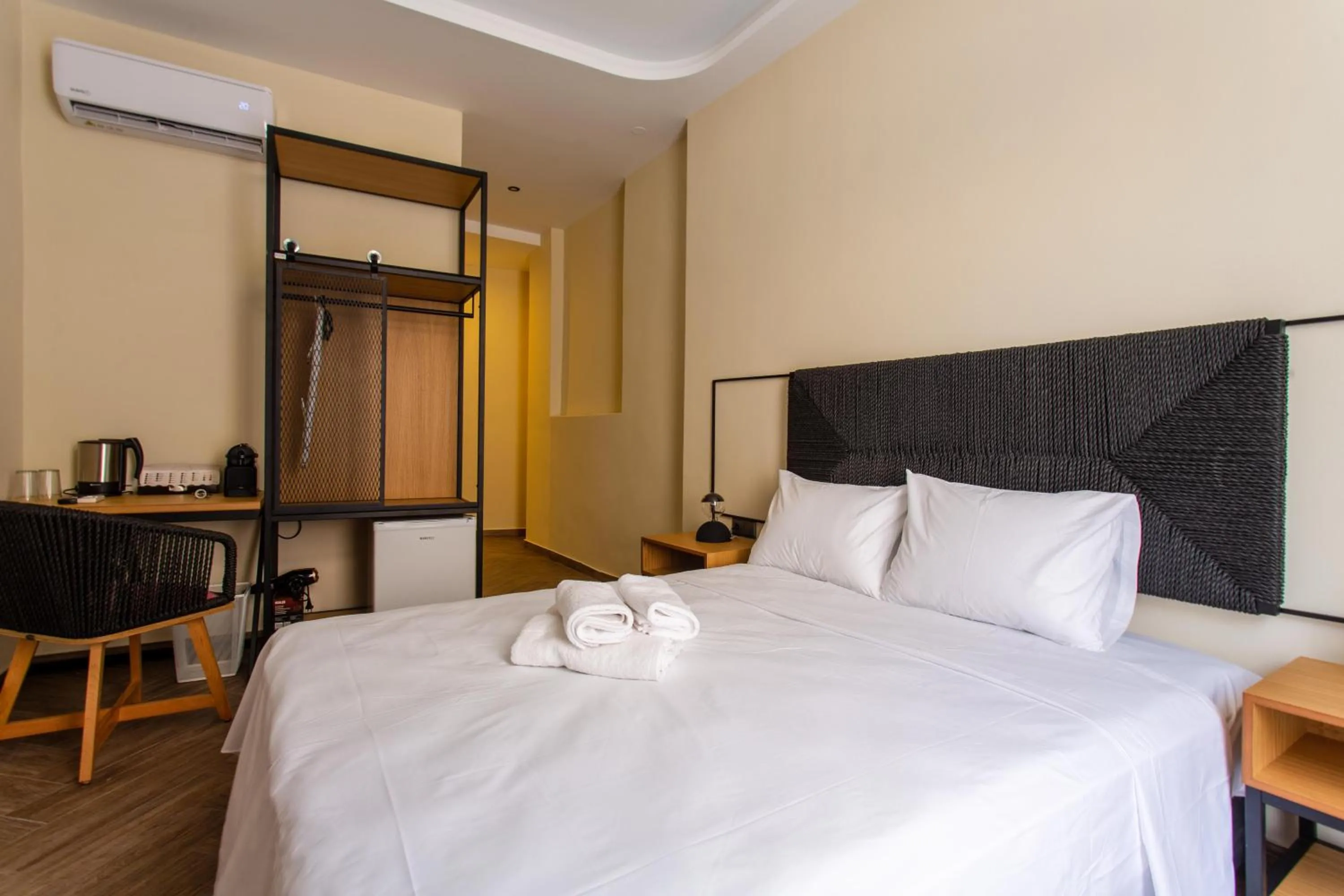 Bed in Leone Suites