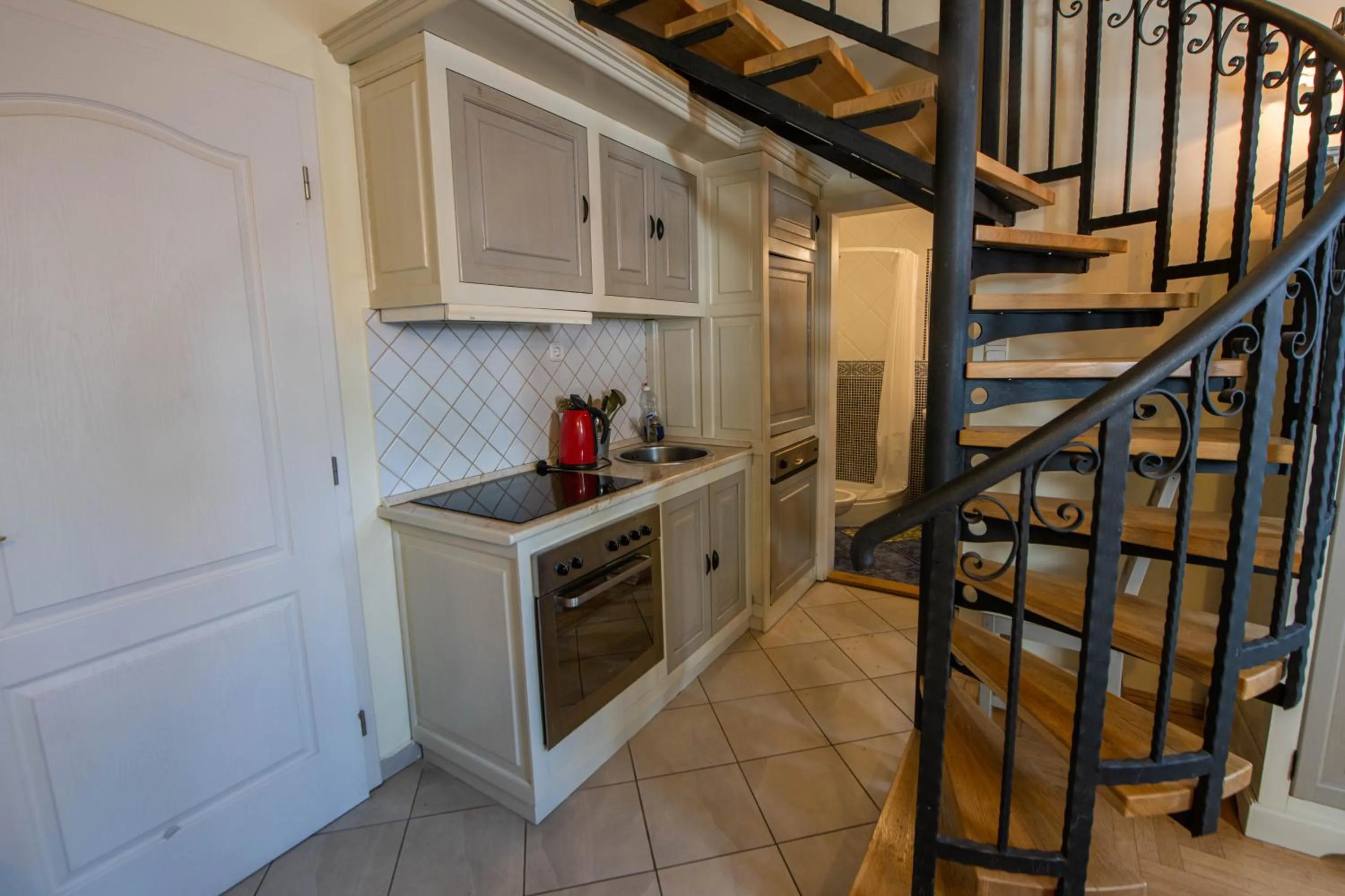 Kitchen or kitchenette in Pater Apartments and Rooms