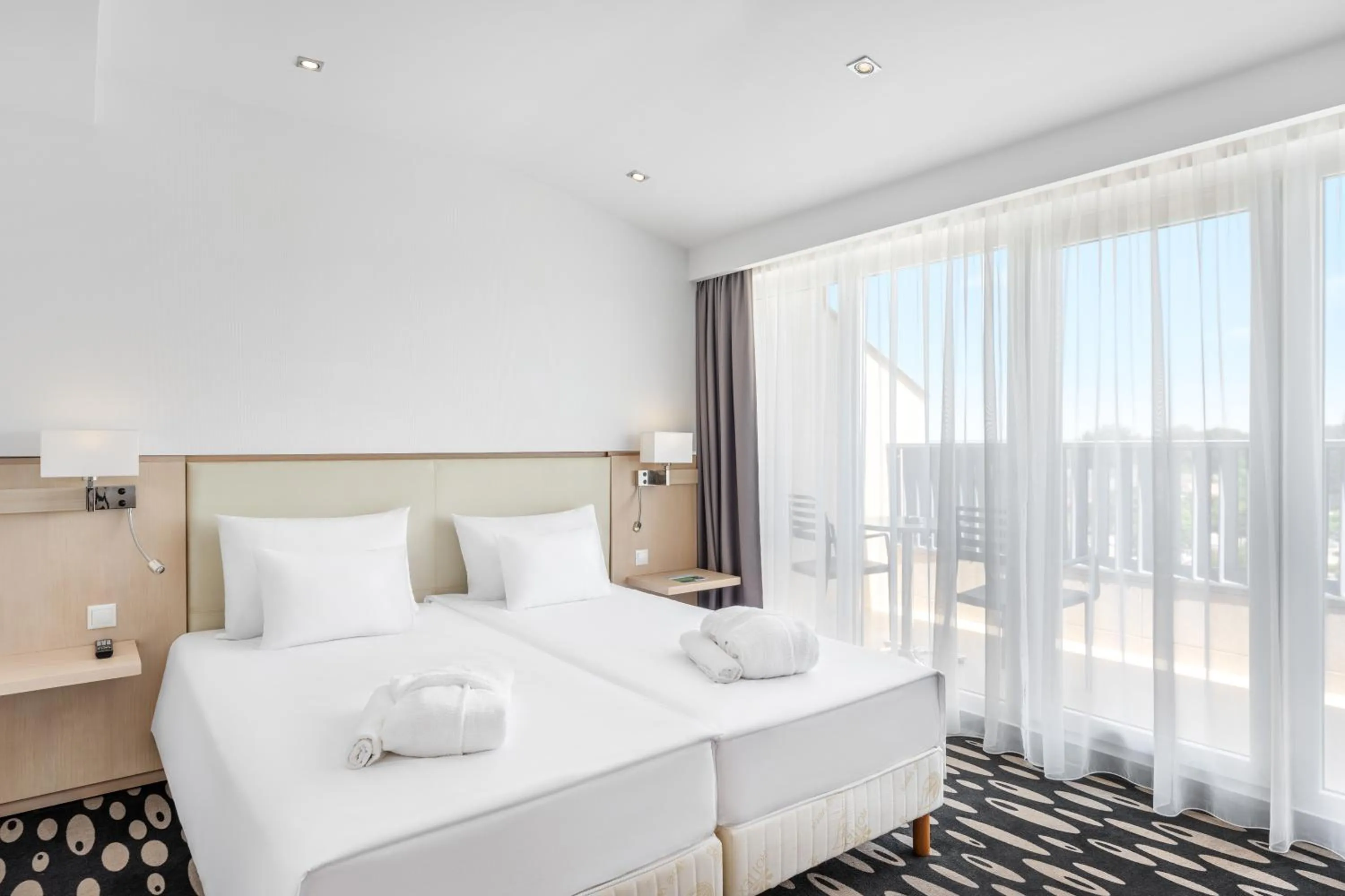 Bedroom, Bed in Park Inn by Radisson Sarvar Resort & Spa - All Inclusive