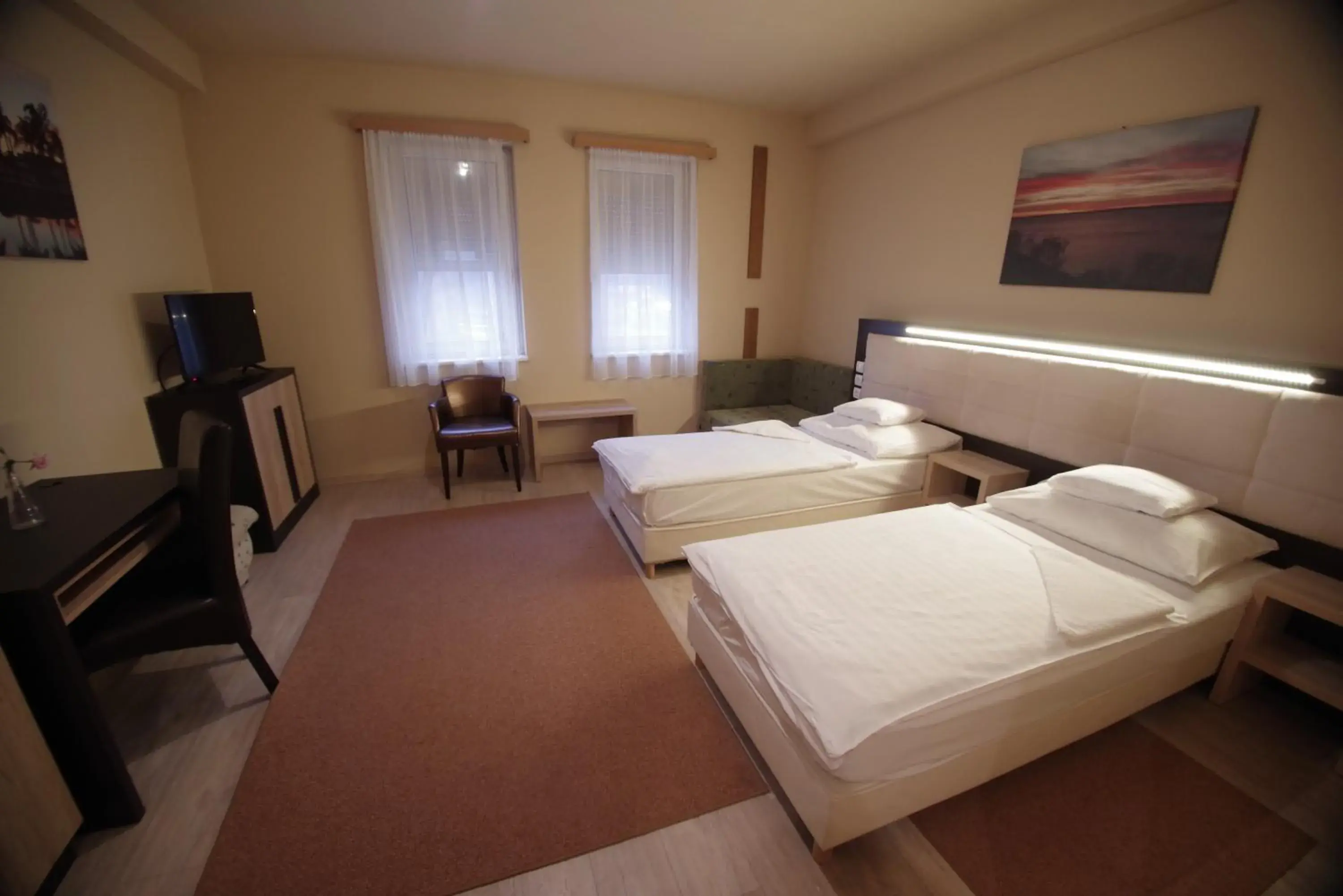 Twin Room with Extra Bed (3 Adults) in Hotel Vadászkürt Superior Twin Room with Extra Bed (3 Adults) in Hotel Vadászkürt Superior